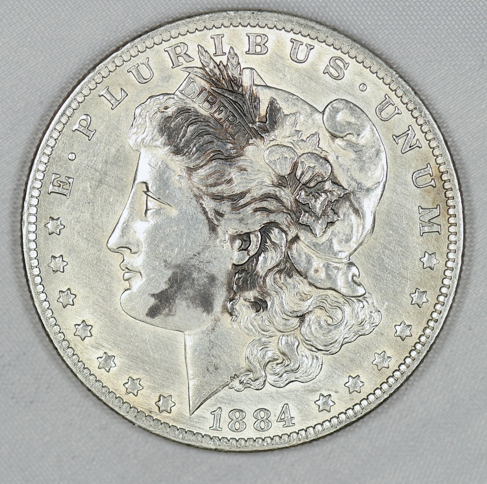 1884 O AU Morgan Silver Dollar  (1 of 2)