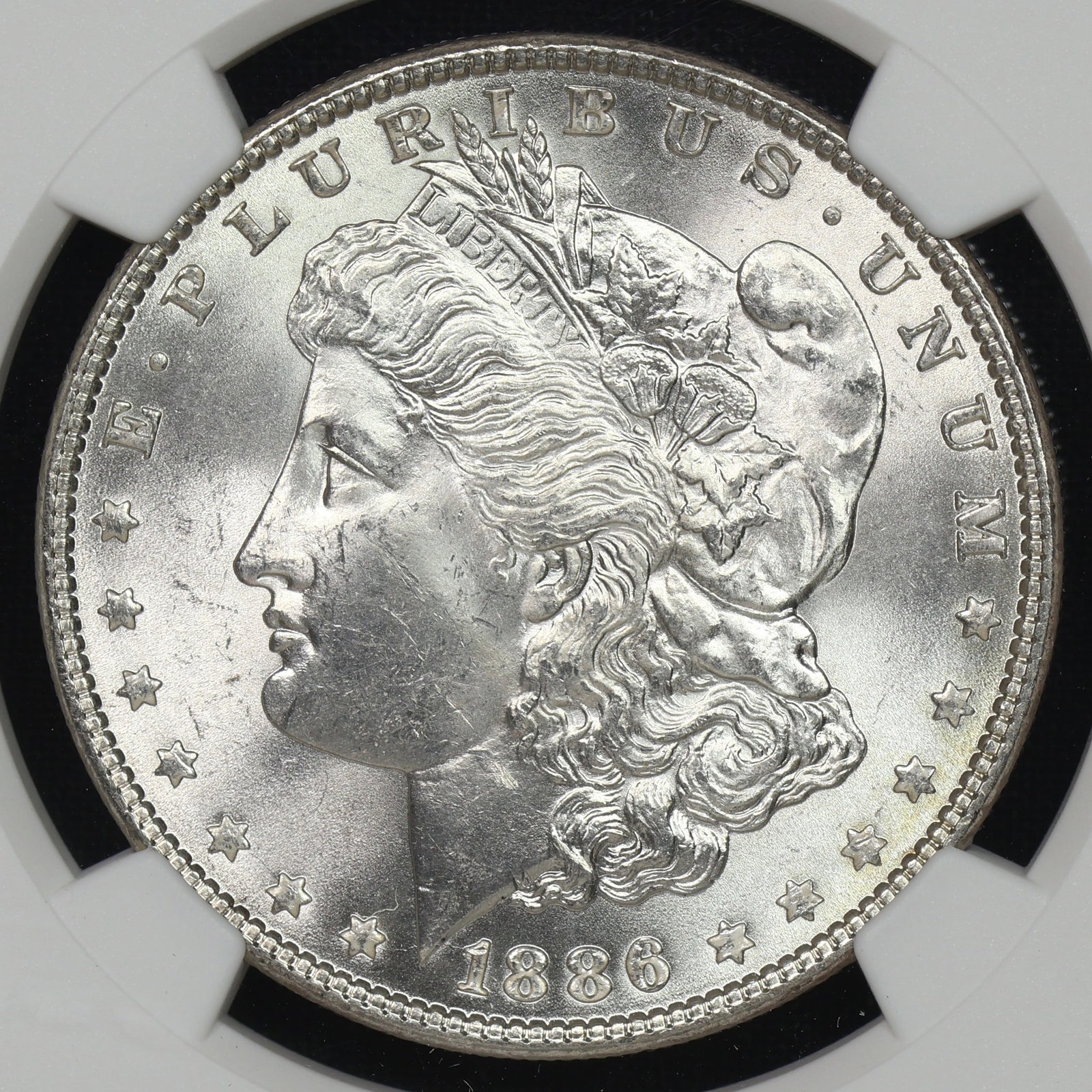 1886 Morgan Silver Dollar NGC MS-63: 1886 Morgan Silver Dollar NGC MS-63