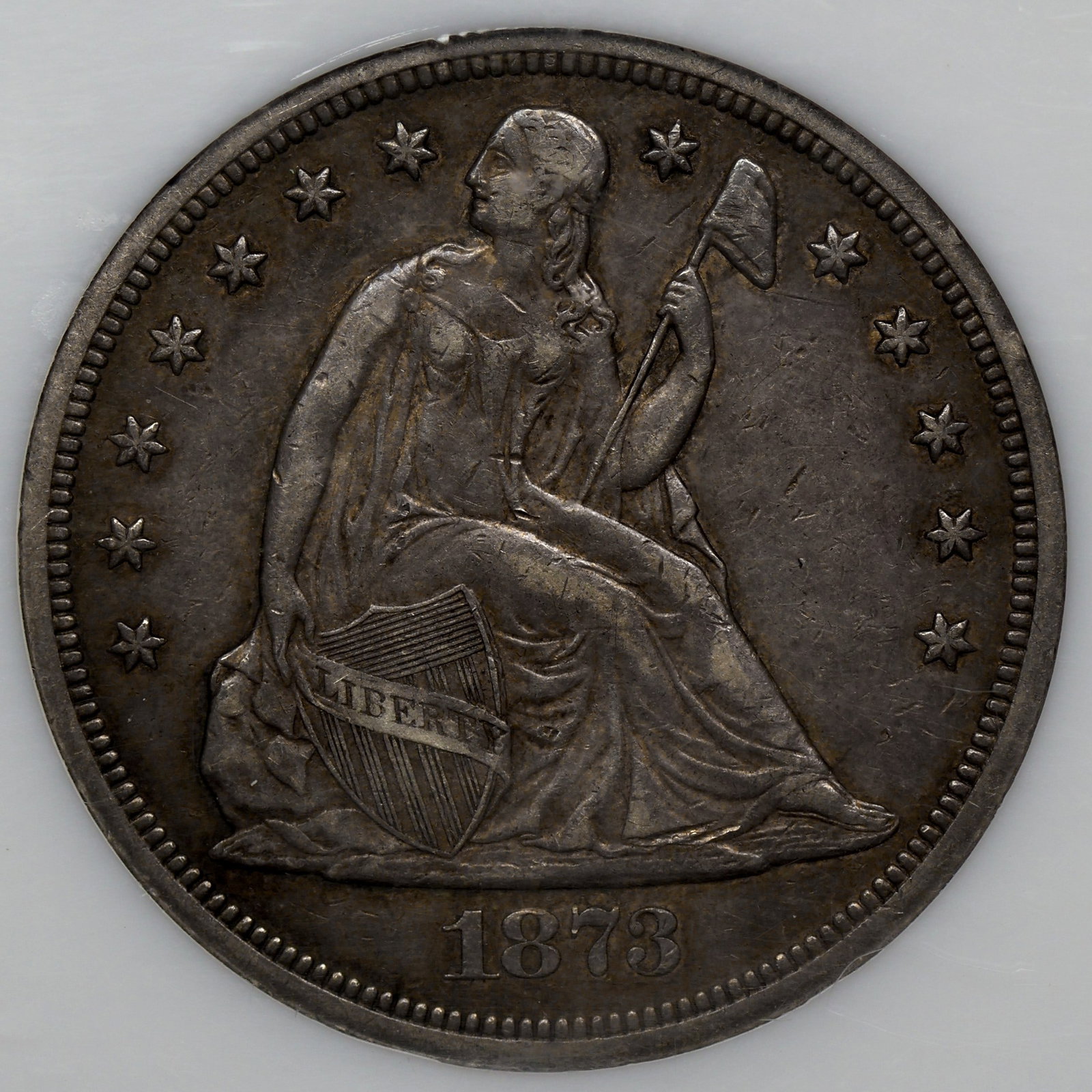 1873 Seated Liberty Dollar AU 50 OLD PCI: Not all coins in the Lampasas collection were sent for grading. This was from a time when PCI was reputable. The grade seems reasonable. Very nice!