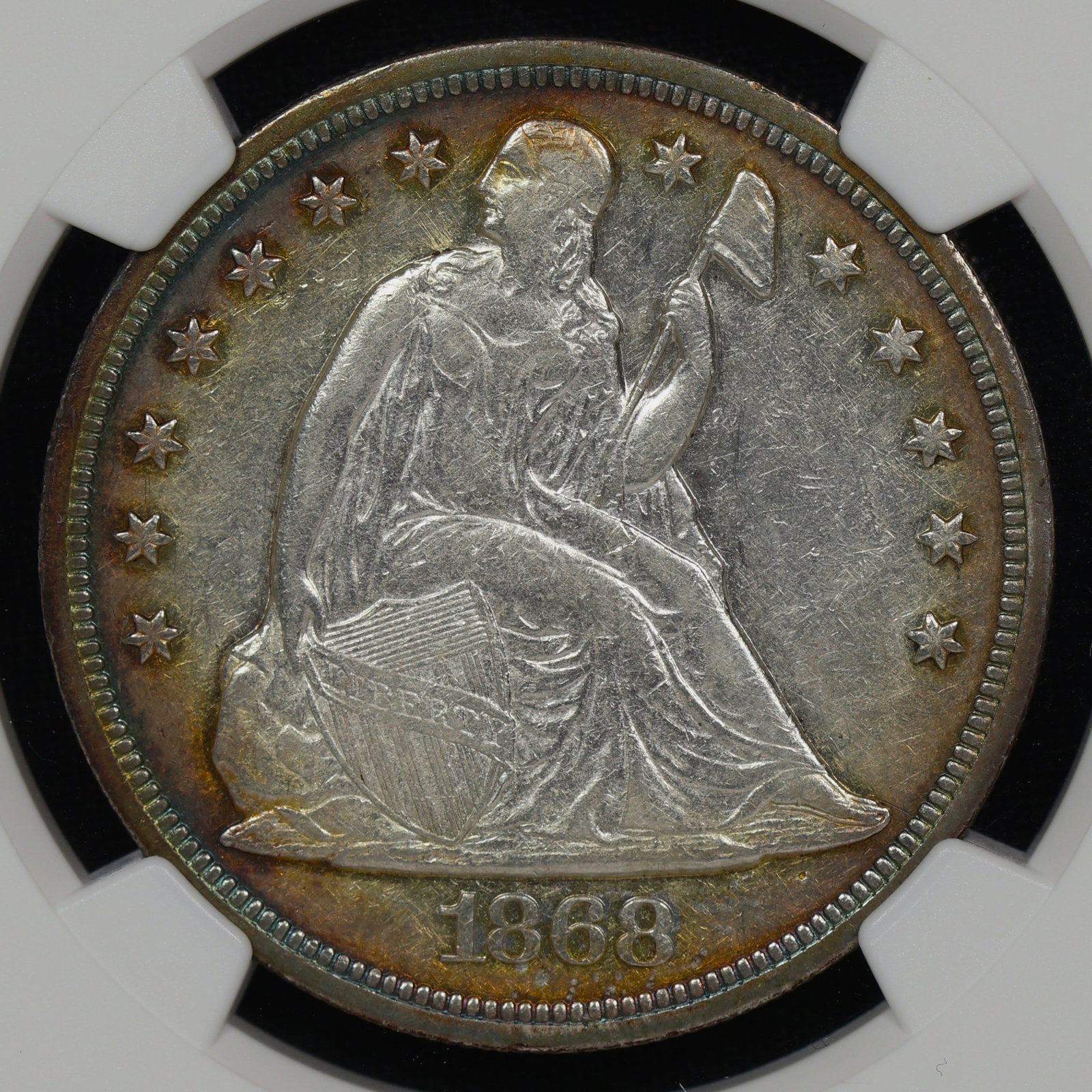 1868 Seated Liberty Dollar AU Details MPD FS-301: FS-301 is a misplaced date of the 6 in the denticles below the date. It's clearly visible, but is not a recognized variety by NGC. There is only ONE attributed at PCGS. Even in a details condition is