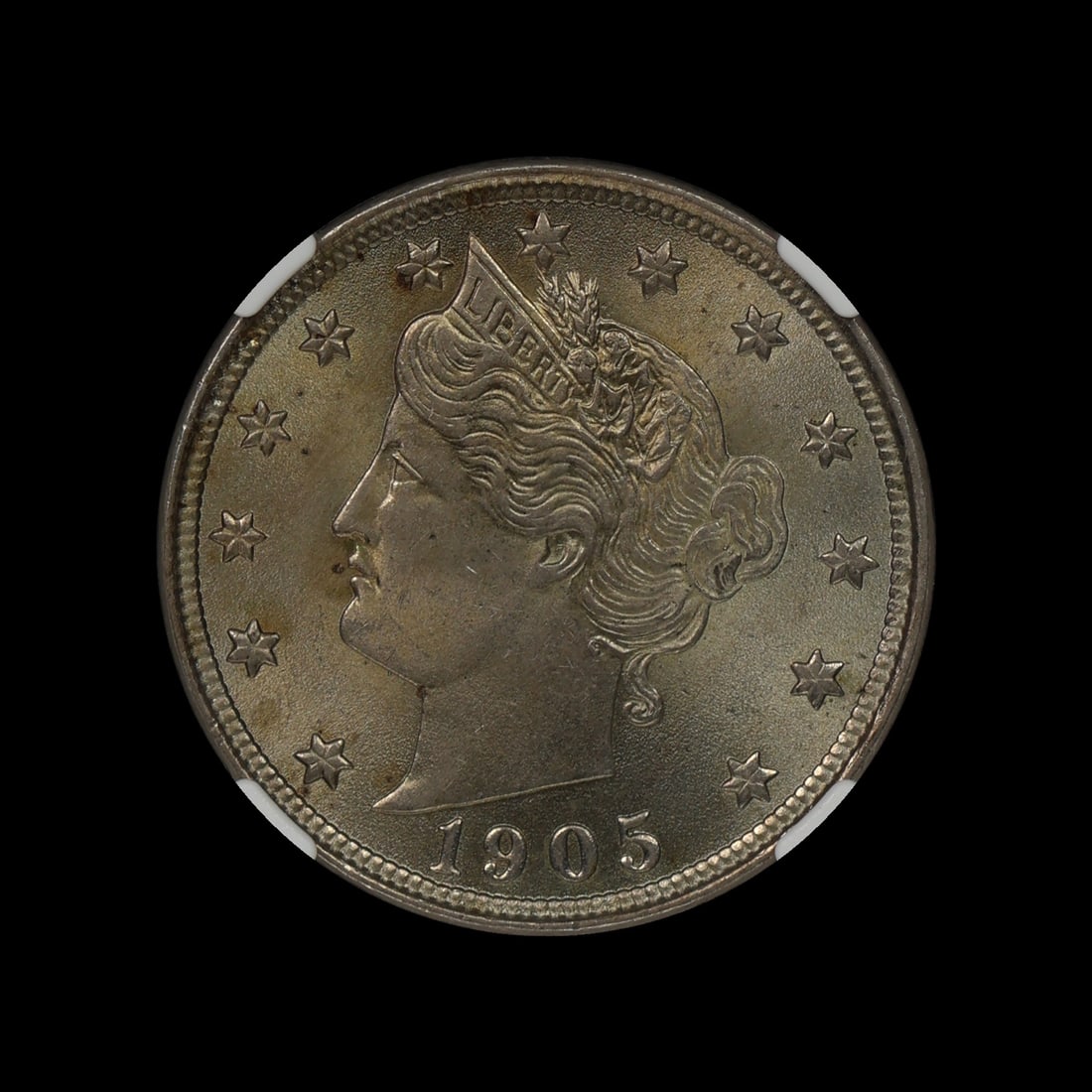 1905 Liberty V Nickel NGC MS 62 UNDERGRADED: (RXPB) Quite harsh for such few marks on the obverse and only a light spot of tone on the hair.