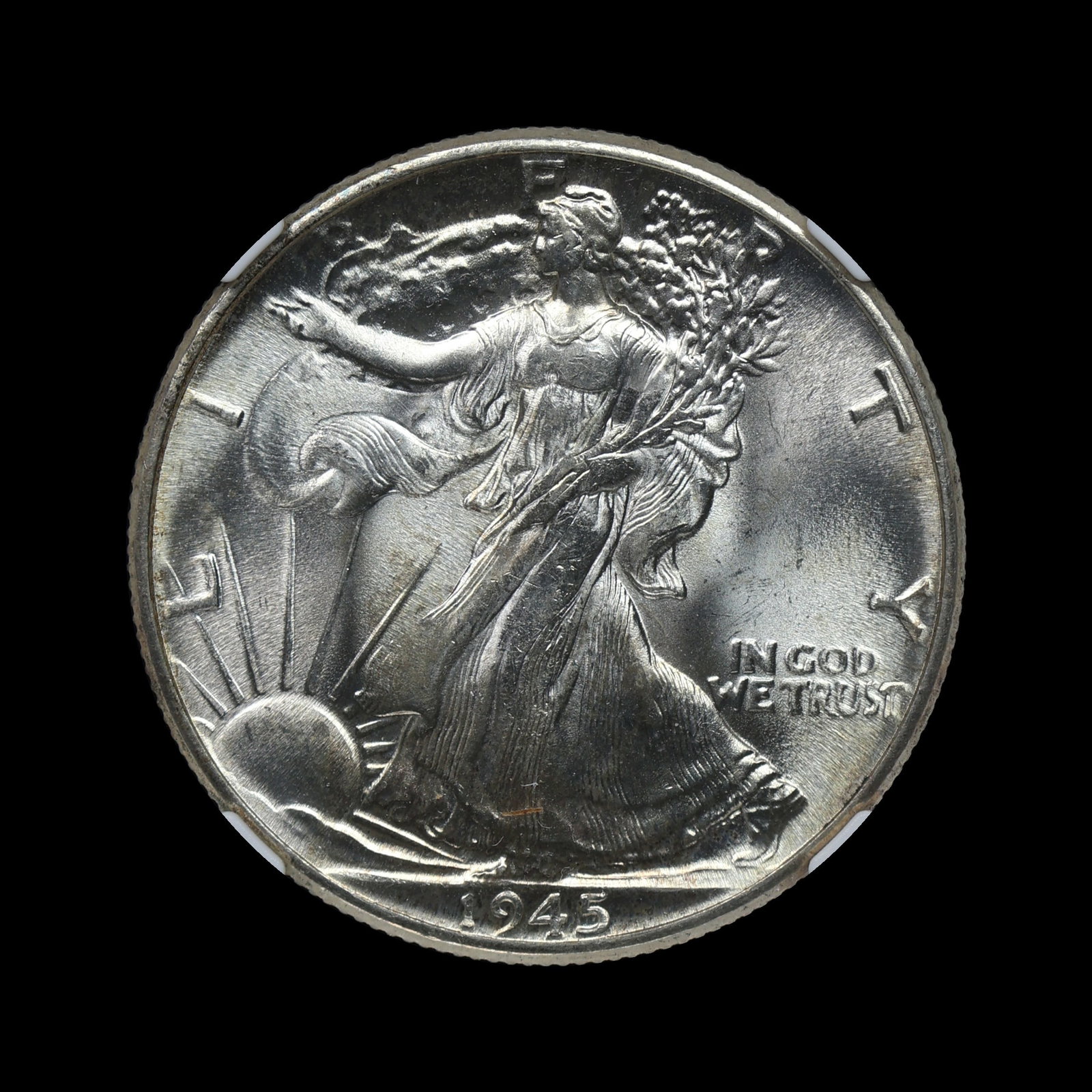 1945 Walking Liberty Half NGC MS 64 UNDERGRADED: (QIMZ) Crystal clear fields with only slight rubbing on the highest points. Unclear how this isn't GEM