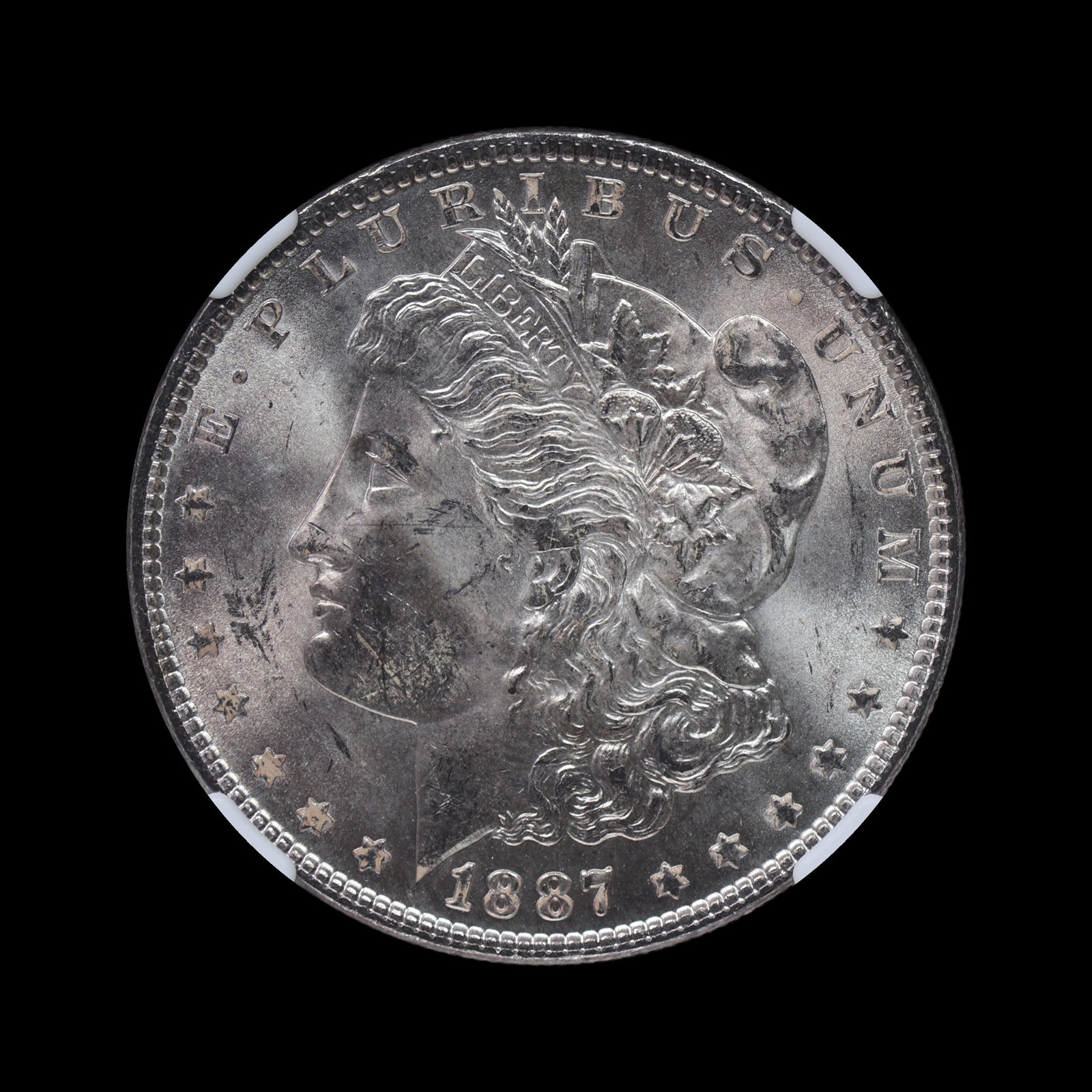 1887 Morgan Silver Dollar NGC MS 63 (1 of 4)
