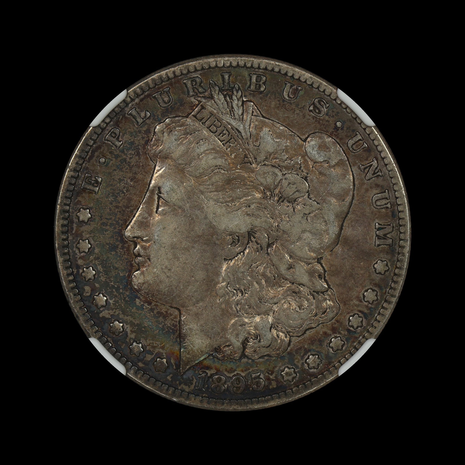 1895 S Morgan Silver Dollar NGC VF 30 BIG KEY DATE: (ZIBV) Pretty swath of rainbow toning underneath.
