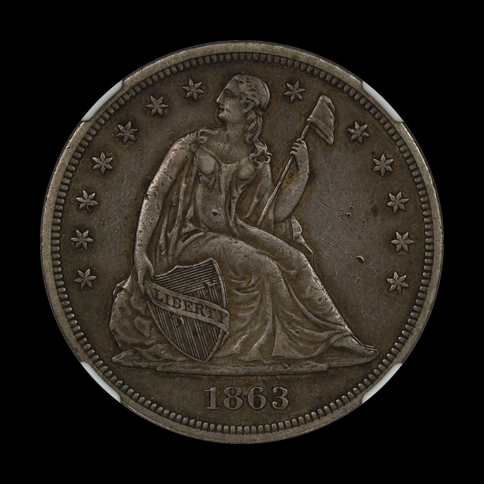 1863 Seated Liberty Silver Dollar NGC AU CIVIL WAR: (TSEE) A handful of small pock marks on the obverse. The reverse is fantastic. RARE Civil War dollar!