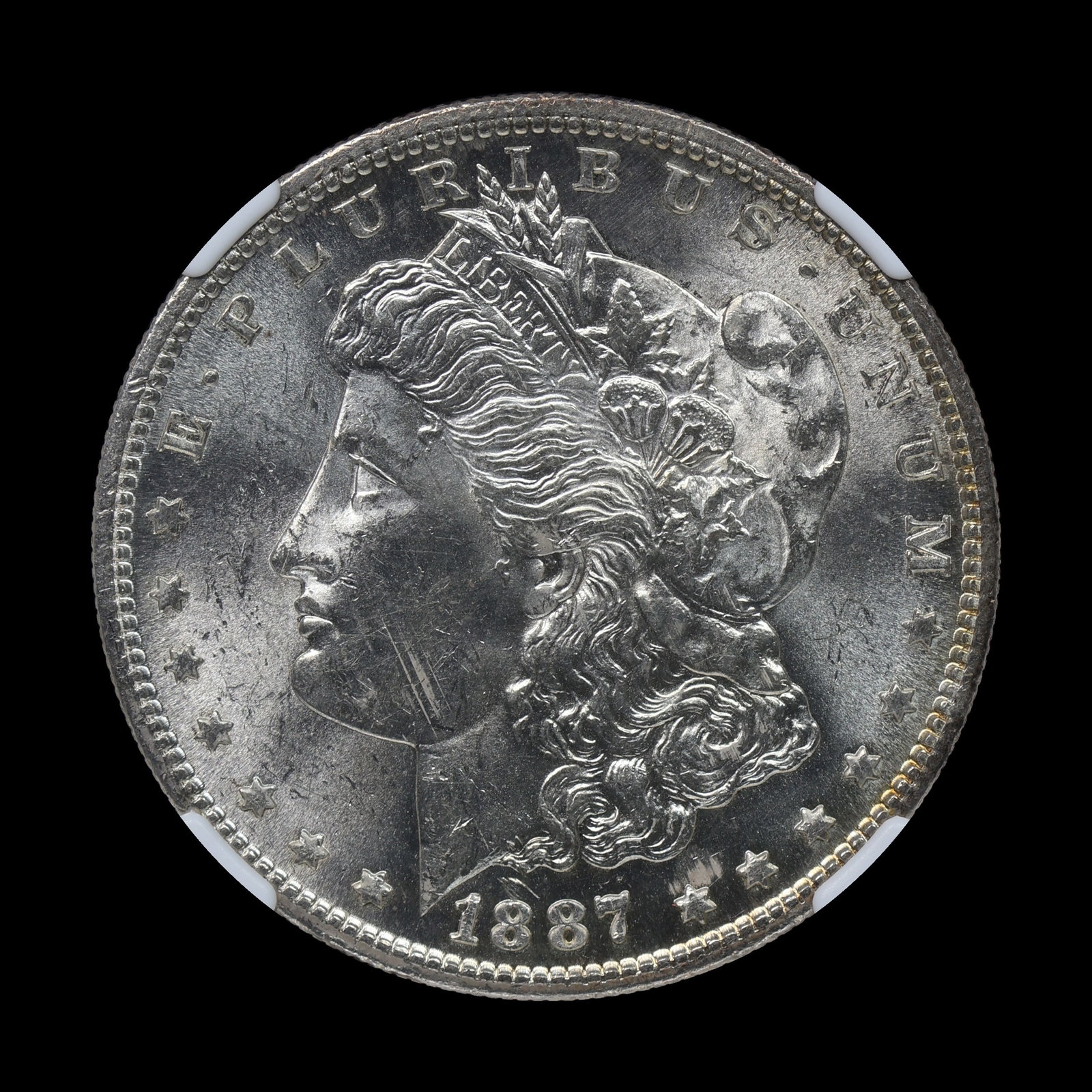 1887 S Morgan Silver Dollar NGC MS 63 BRIGHT (1 of 4)