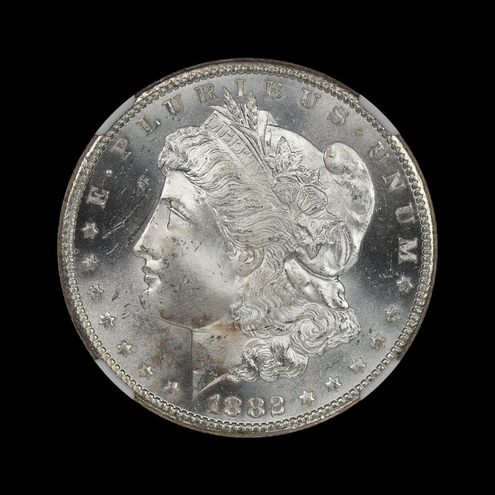 1882 CC Morgan Silver Dollar NGC MS 64 FROSTY: (YVBW) Magnificently frosted devices!