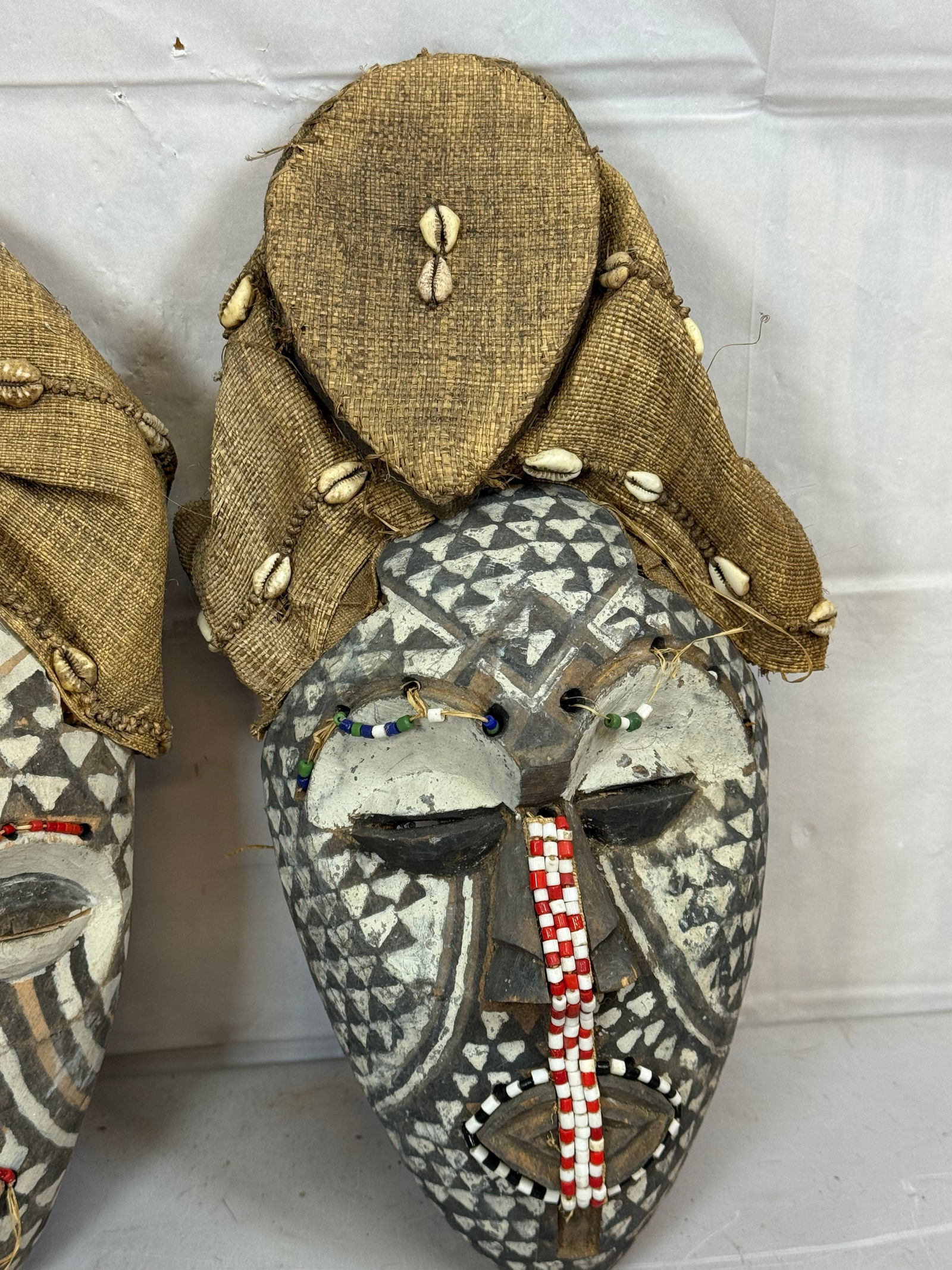 Pair of Hand Carved Wooden Kuba-Style Masks: Pair of Hand Carved Wooden Kuba-Style Masks, Beaded