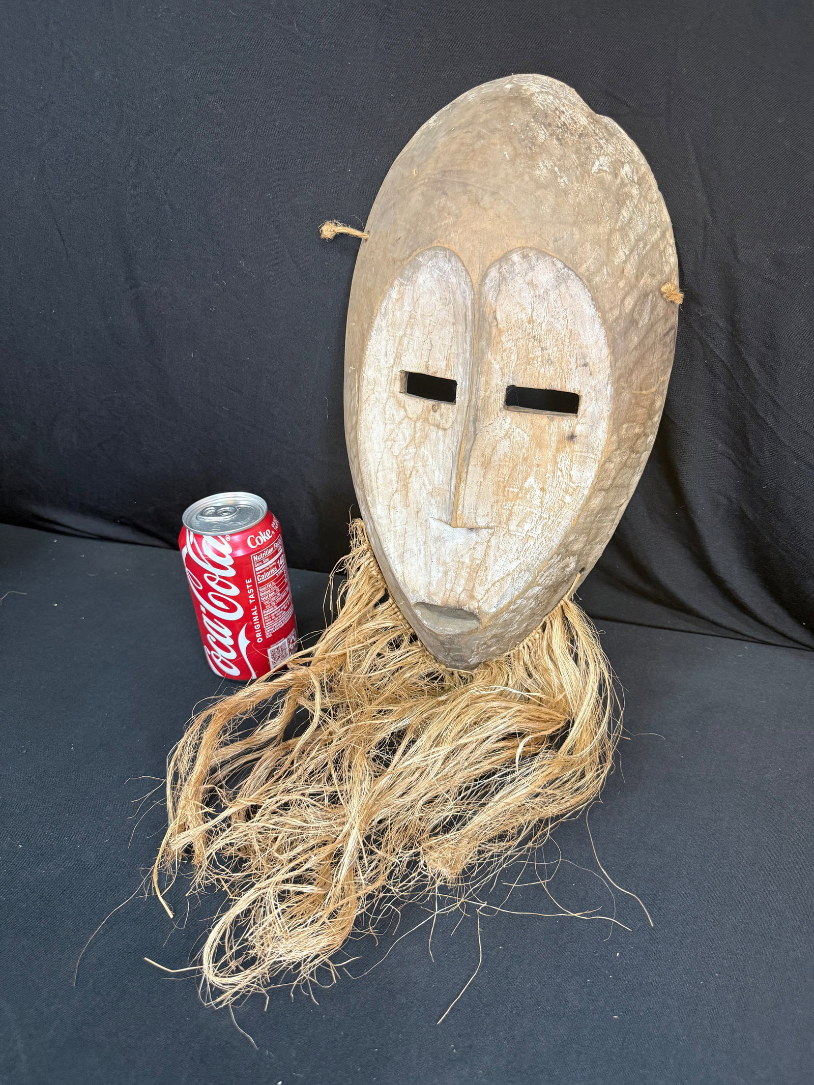 Hand carved wooden African mask w/twine beard: Hand carved wooden African mask w/twine beard