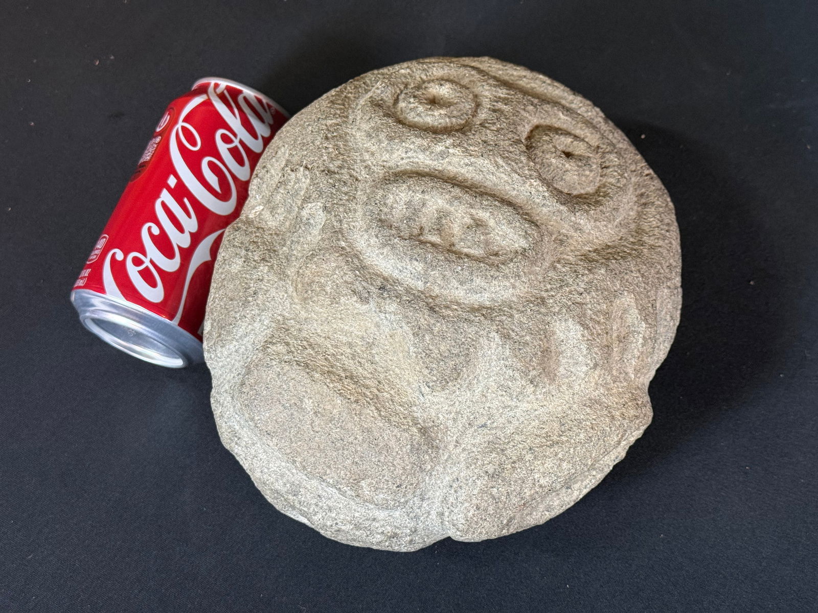 Carved stone face rock (1 of 2)