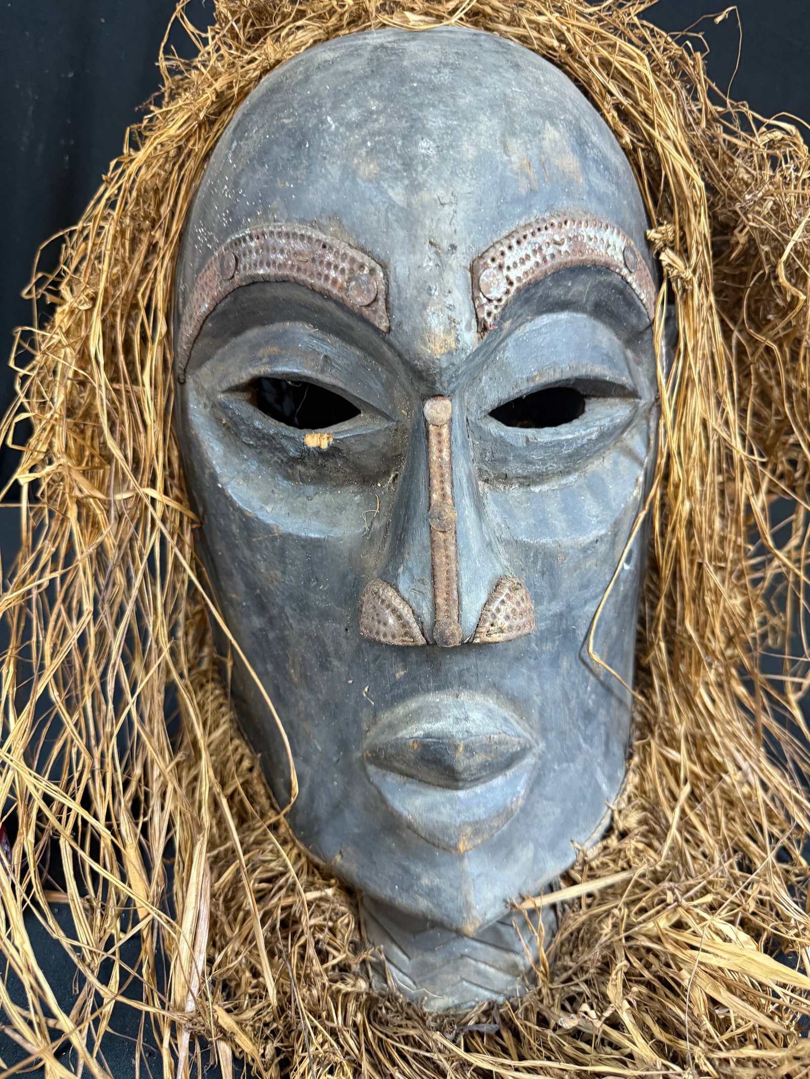 Raffia straw and wood african mask: Raffia straw and wood african mask