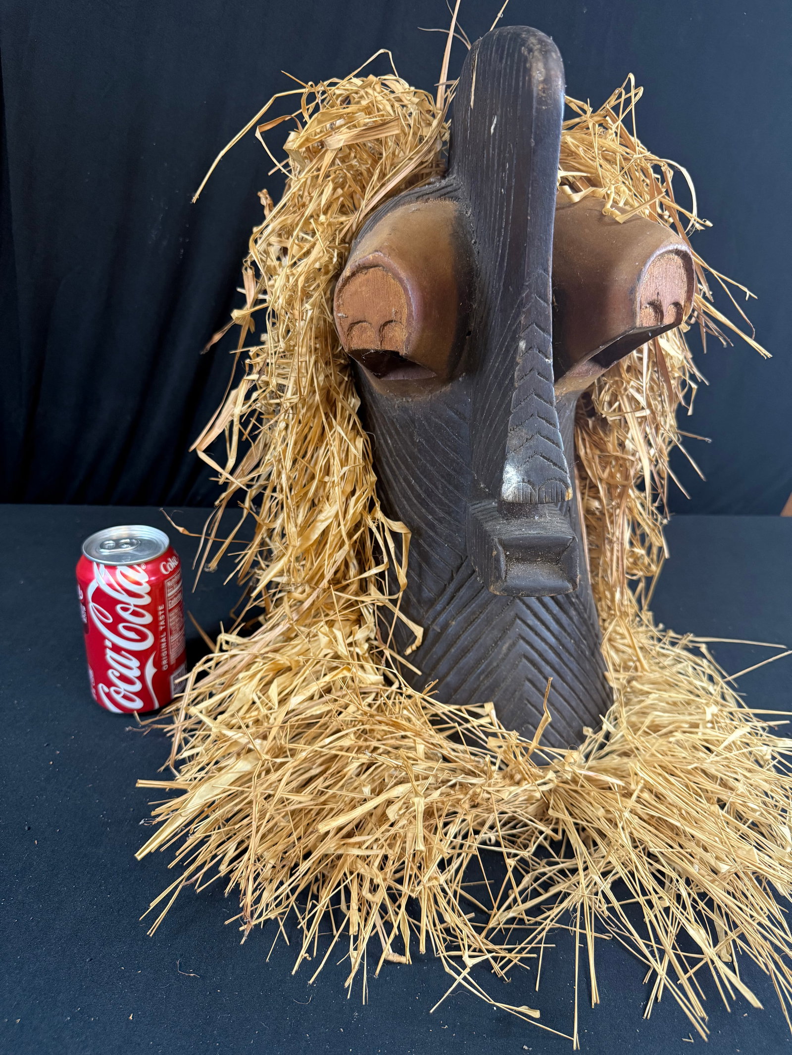 Carved wood and Raffia straw African mask: Carved wood and Raffia straw African mask
