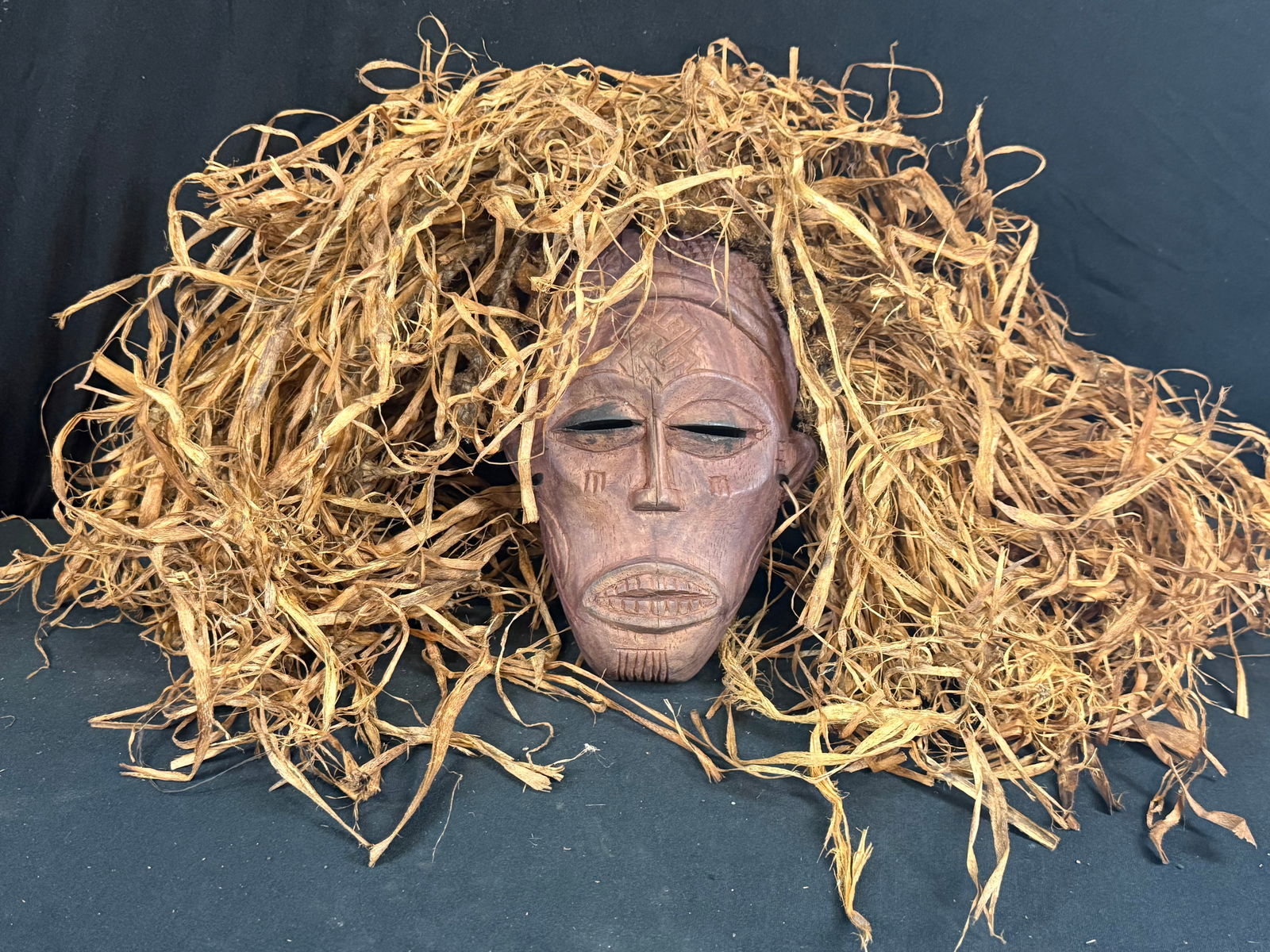Hand carved wooden African Mask with Raffia straw: Hand carved wooden African Mask