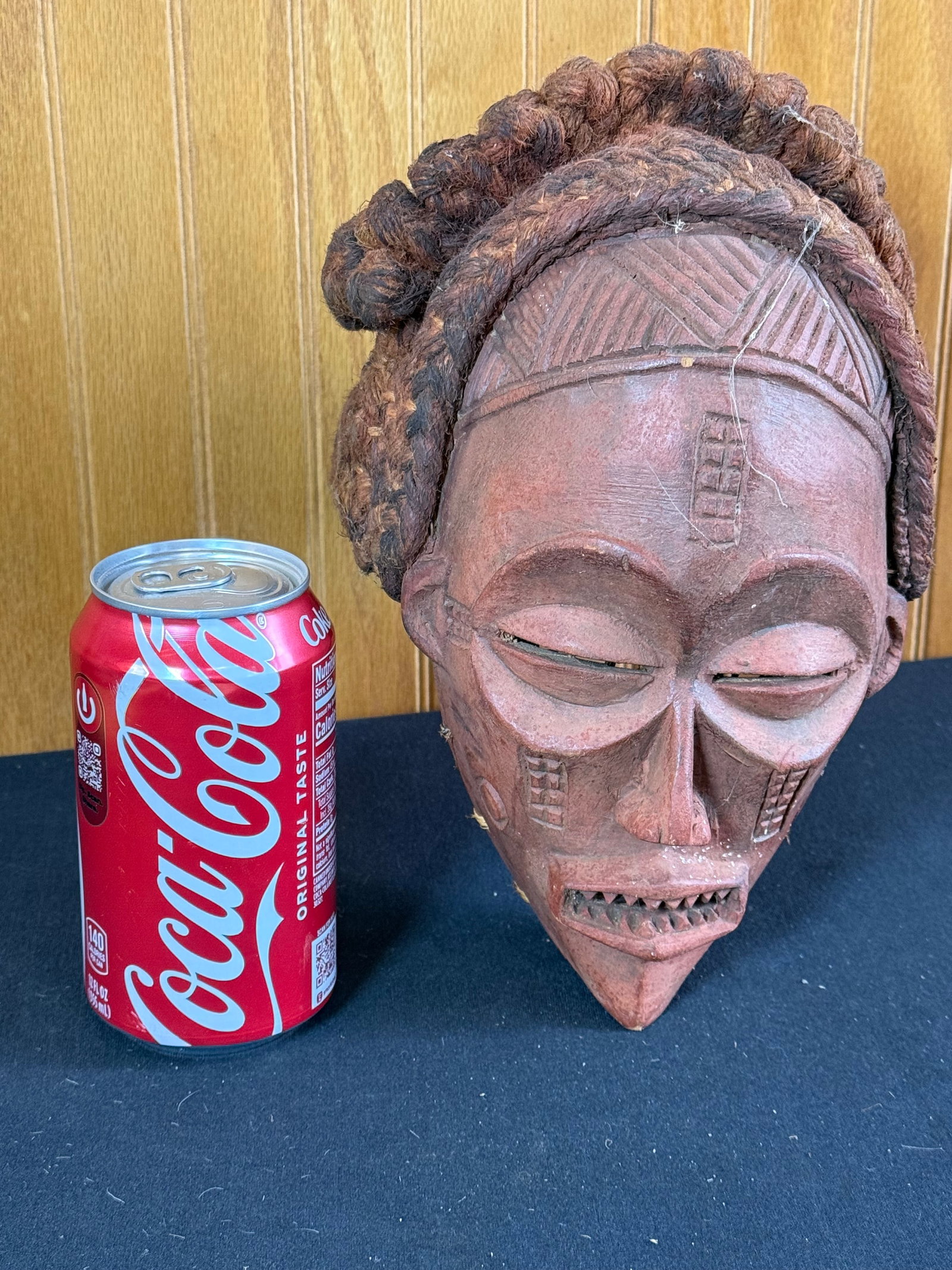 Hand carved wooden African mask w/yarn hair: Hand carved wooden African mask w/yarn hair