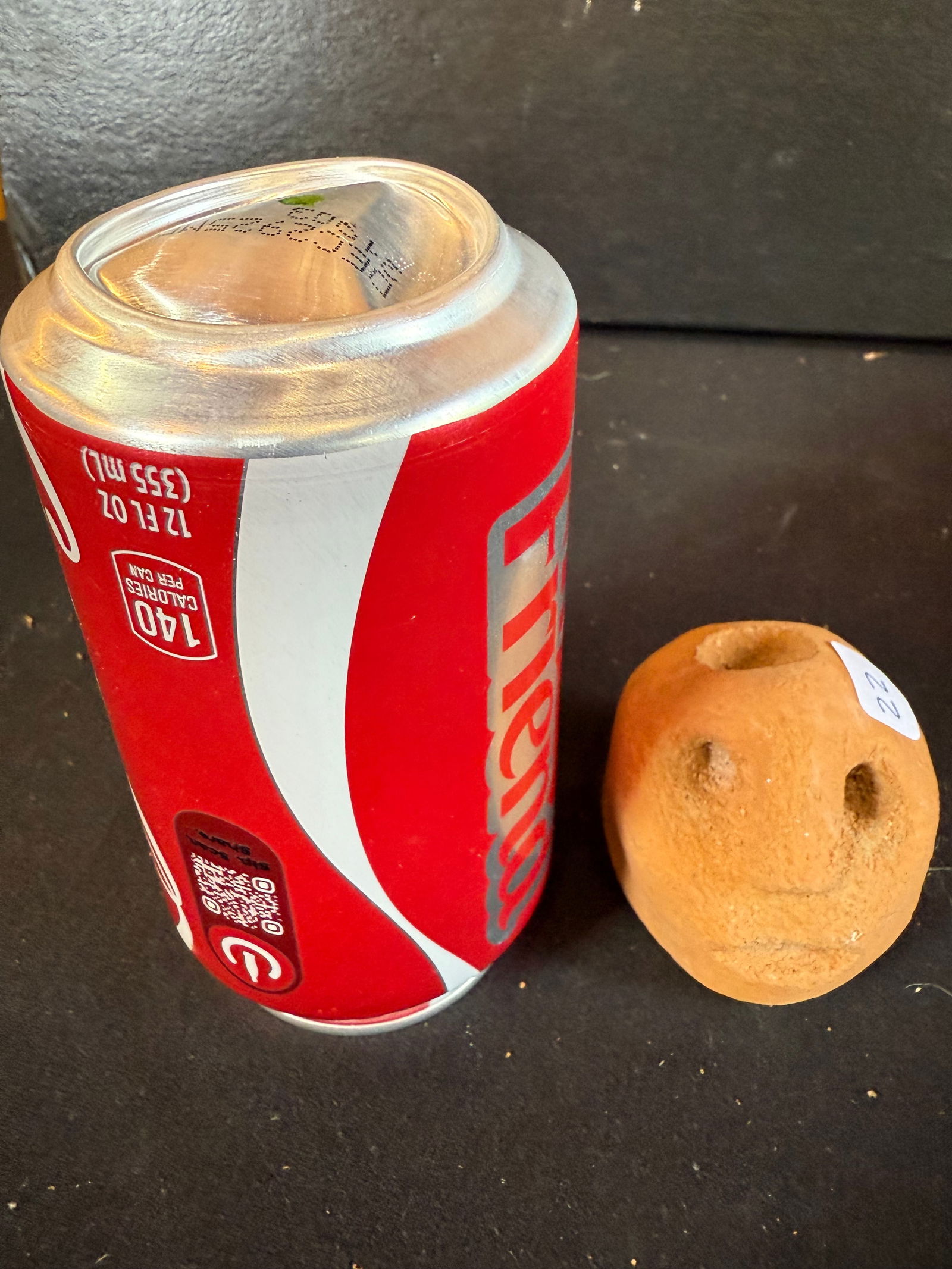 Clay terracotta pottery face pipe (1 of 3)