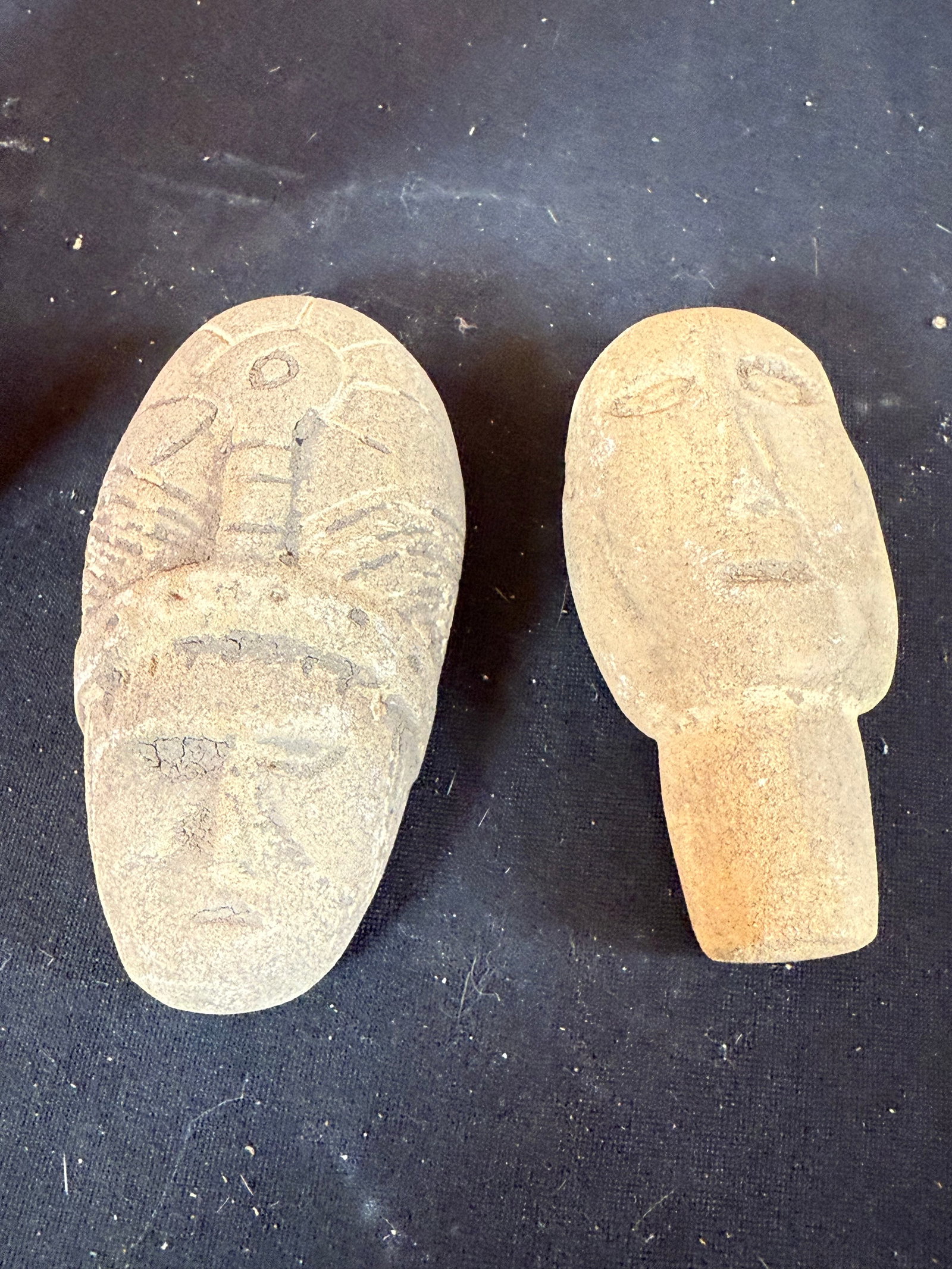 Lot of 2 stone faces: Lot of 2 stone faces