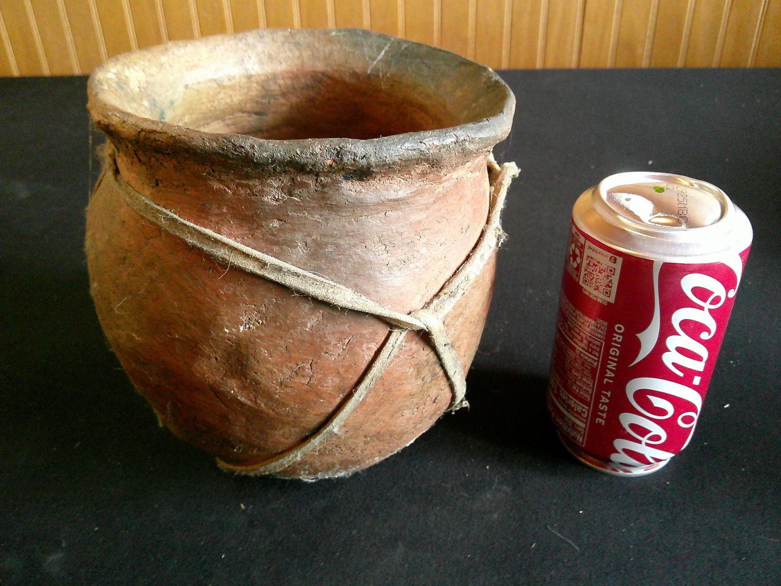 Terracotta pottery vase with rawhide wrap (1 of 2)