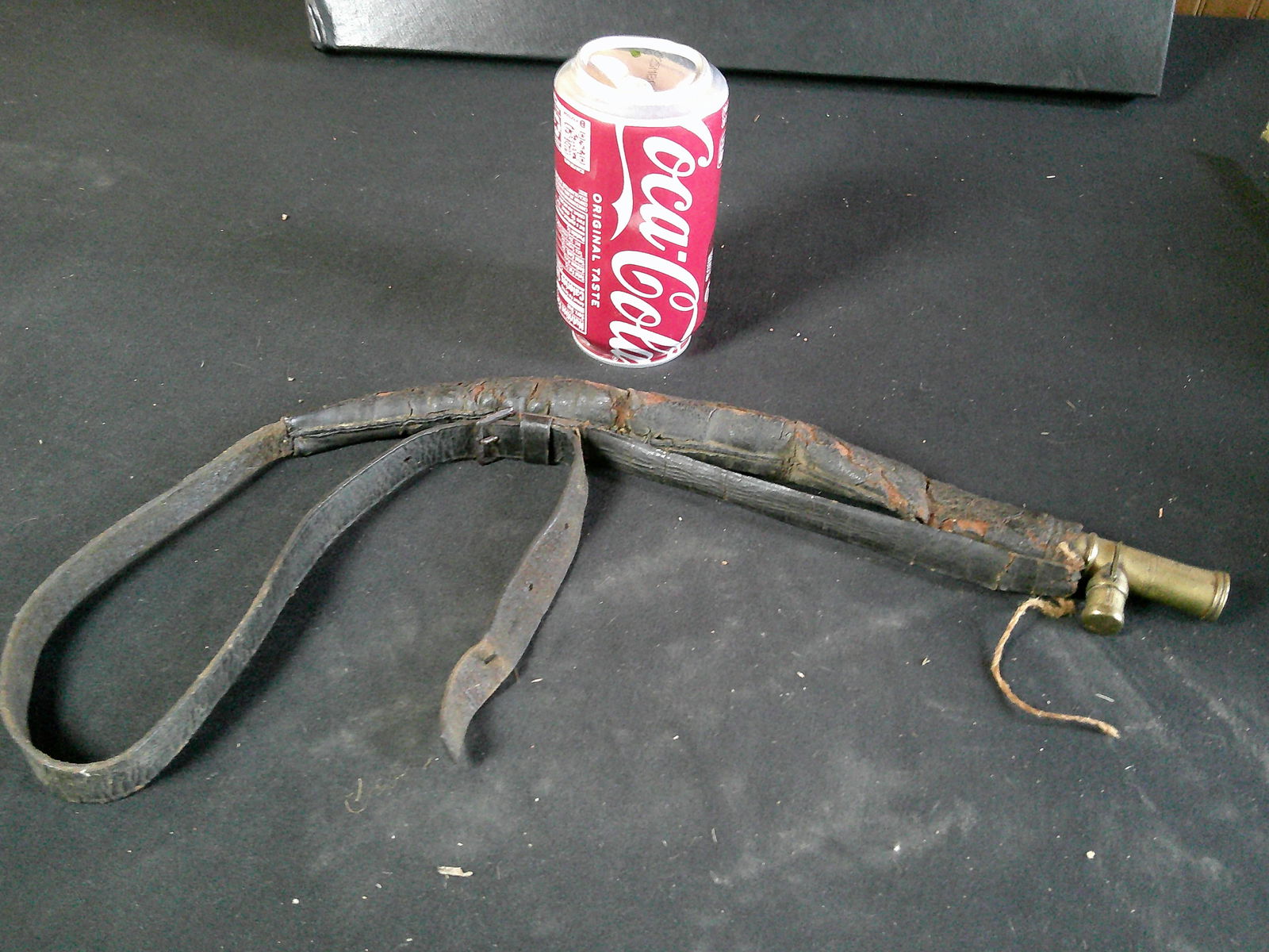 Antique leather black powder flask: Antique leather black powder flask