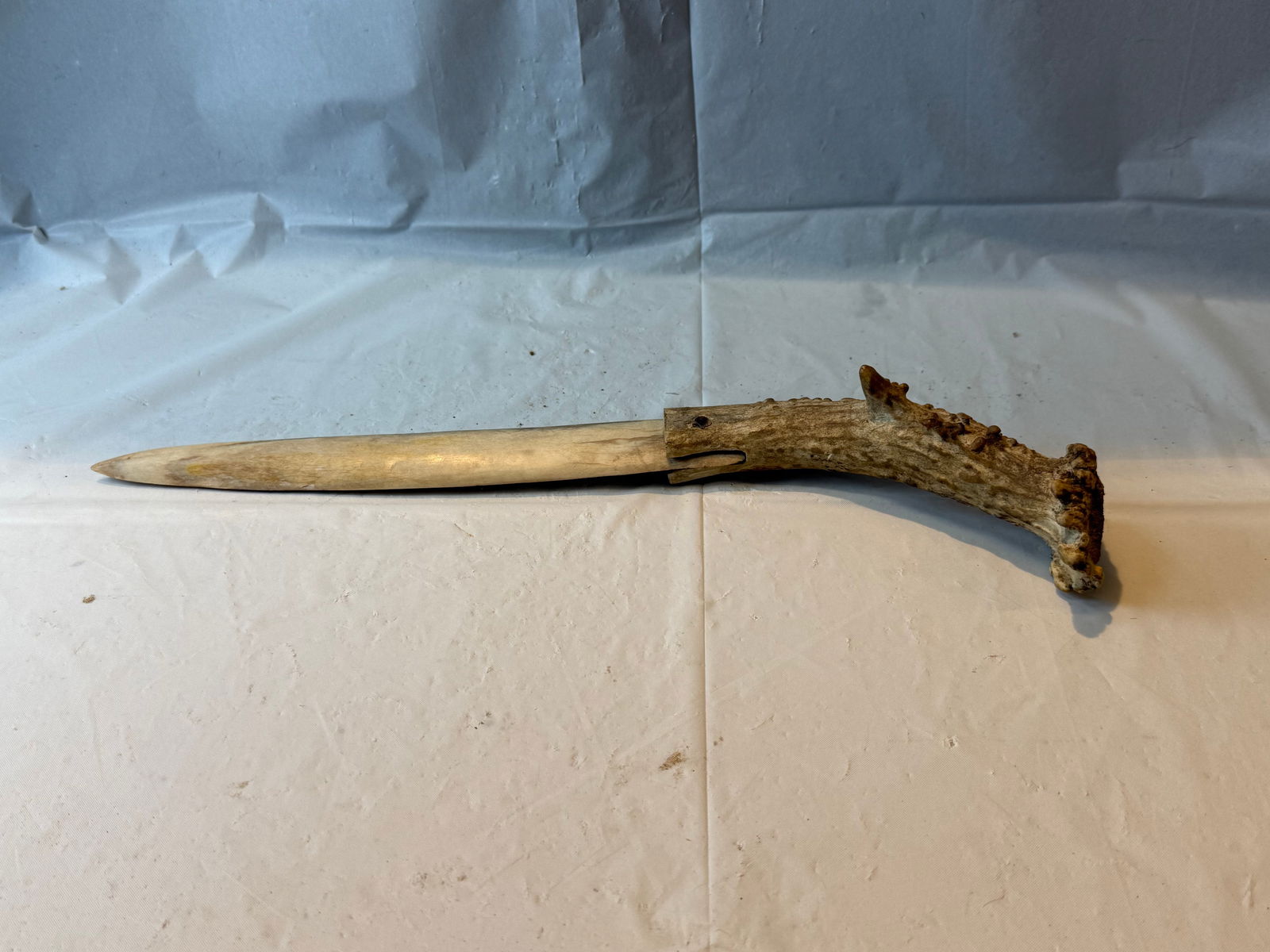 Early antler-handled bone knife: Early antler-handled bone knife