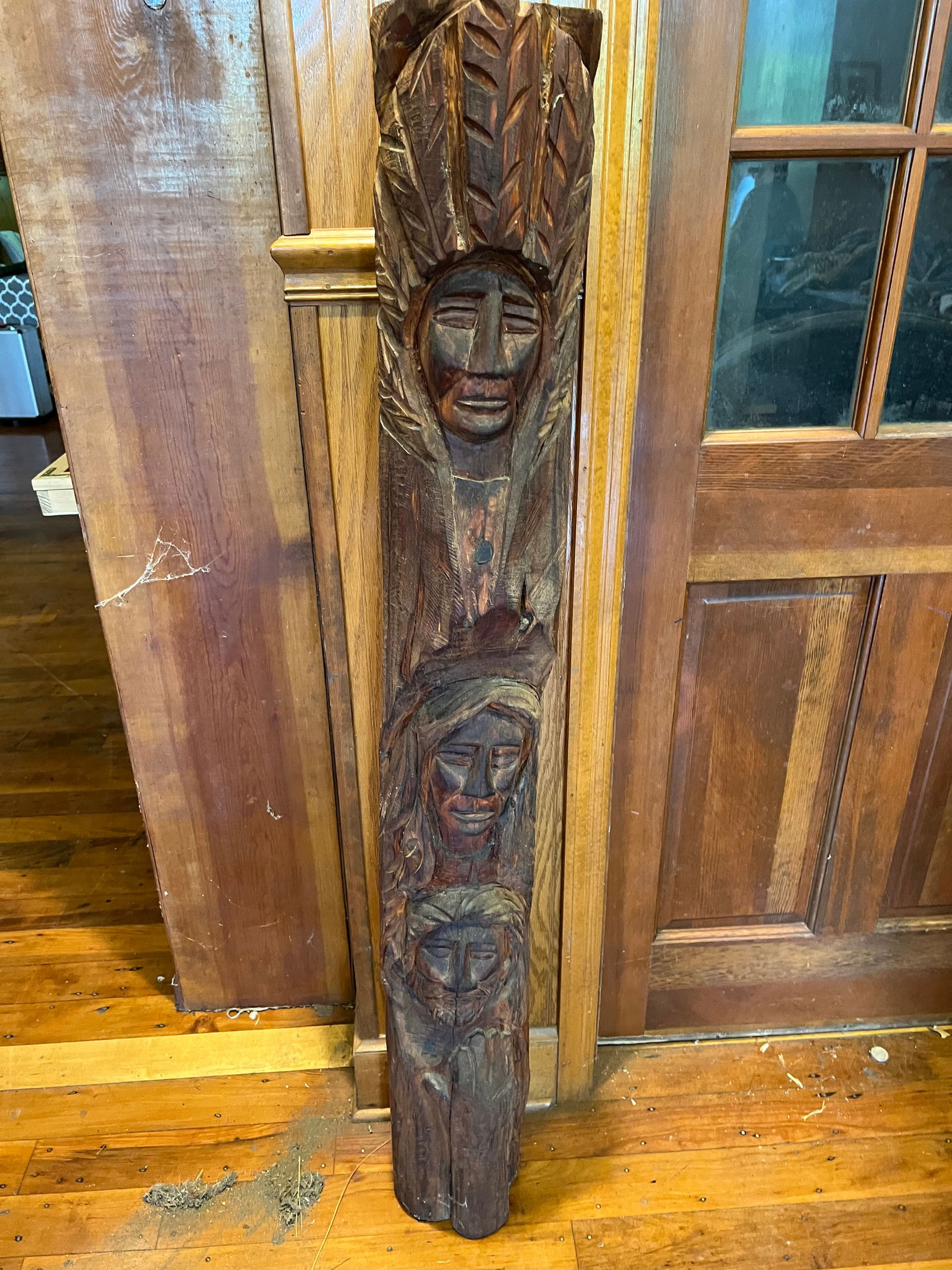 Carved wooden totem pole (1 of 7)