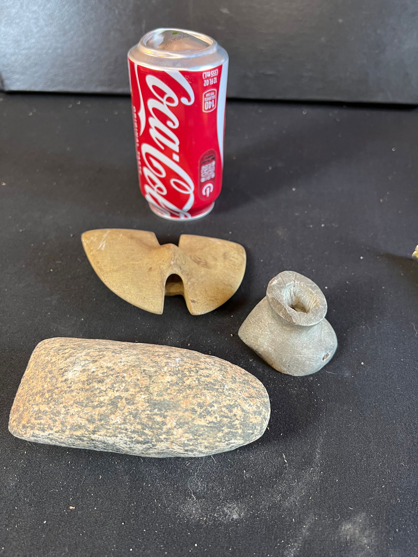 Bannerstone, axehead, & pipe (1 of 4)