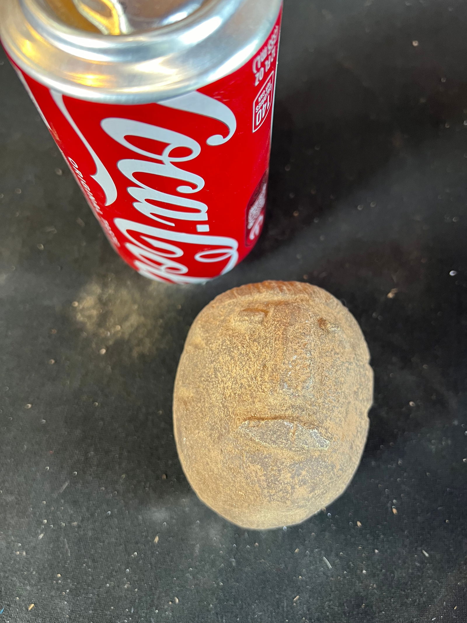 Carved stone face (1 of 3)