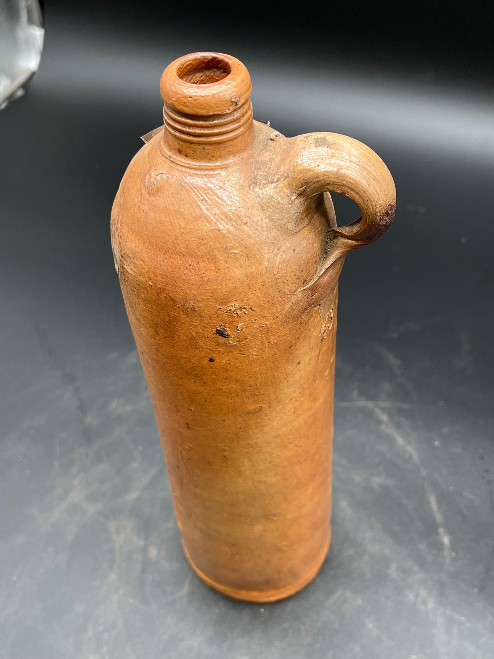 Tall Stoneware Bottle: Tall Stoneware Bottle. (344)