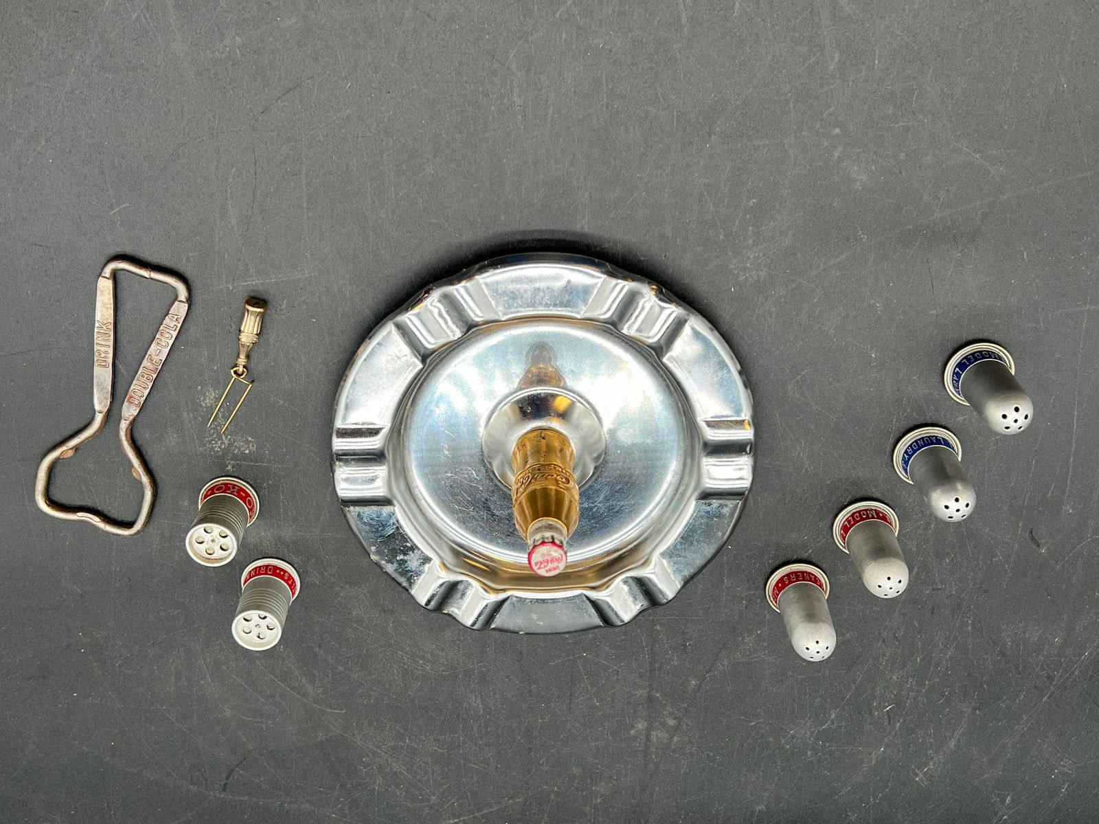 Lot of 9 Early Advertising Collectibles: Lot of 9 Early Advertising Collectibles. Double Cola bottle opener, Coca Cola Ashtray, Coca Cola Pin, and salt and pepper shakers