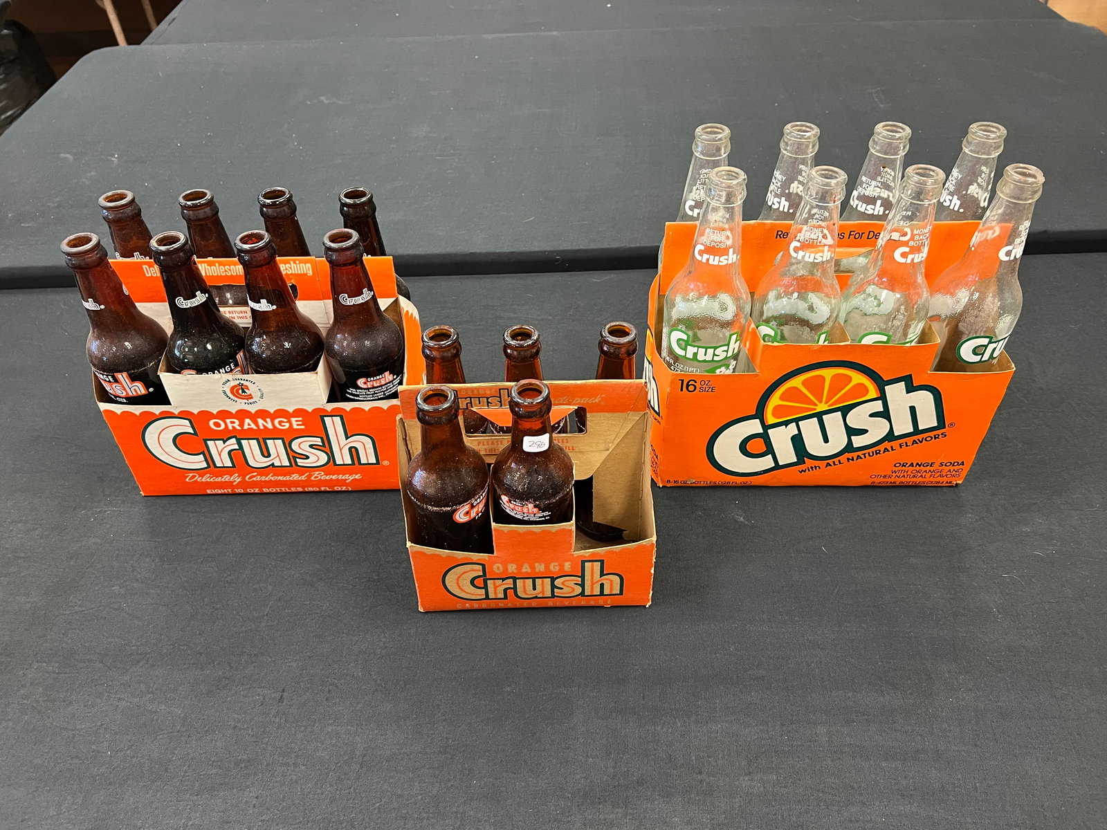 Lot of 3 Packs of Crush Soda: Lot of 3 Packs of Crush Soda. 5 pack of 7 oz bottles, 8 pack of 10 oz bottles, and 8 pack of 16 oz bottles. All in cardboard carriers