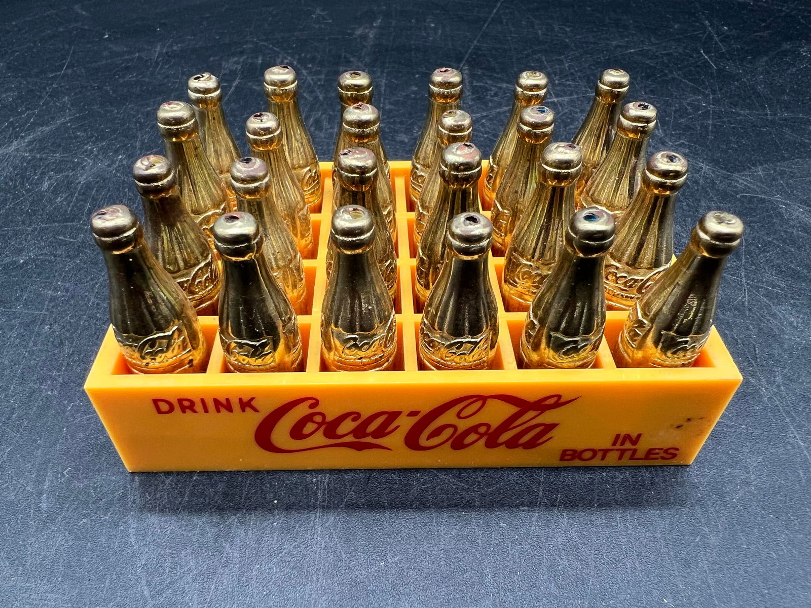 1960â€™s 24 Pack of Gold Miniature Bottles in Plastic Carrier: 1960â€™s 24 Pack of Gold Miniature Bottles in Plastic Carrier
