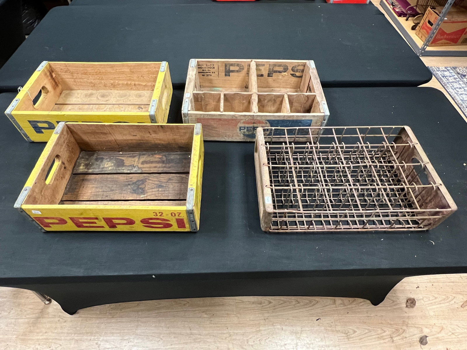 Lot of 4 Wooden and Metal Cola Crates: Lot of 4 Wooden and Metal Cola Crates. 1 metal crate and 3 Pepsi crates