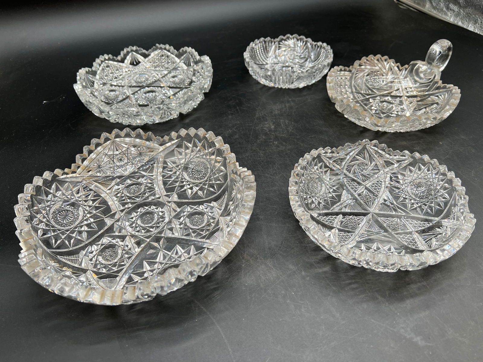 5 pc. Cut Glass Bowls/Nappy: 5 pc. Cut Glass Bowls/Nappy. 4 graduated bowls and a nappy