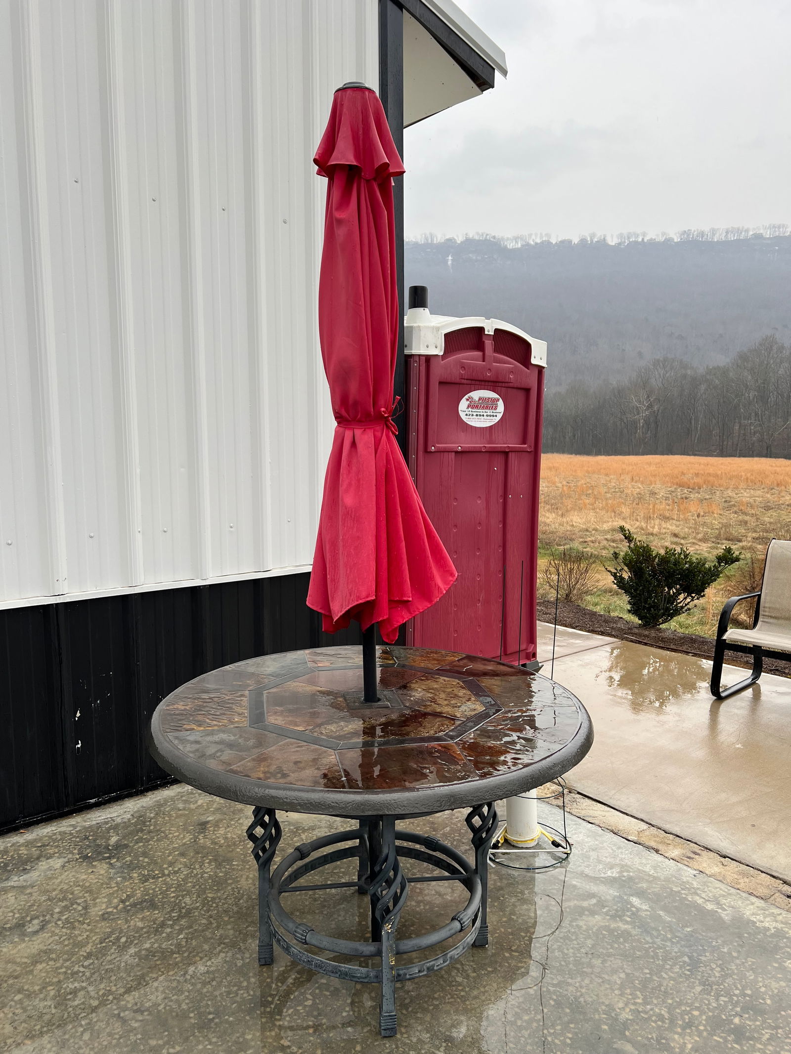 Round Granite Top Outdoor Table With Umbrella (1 of 4)