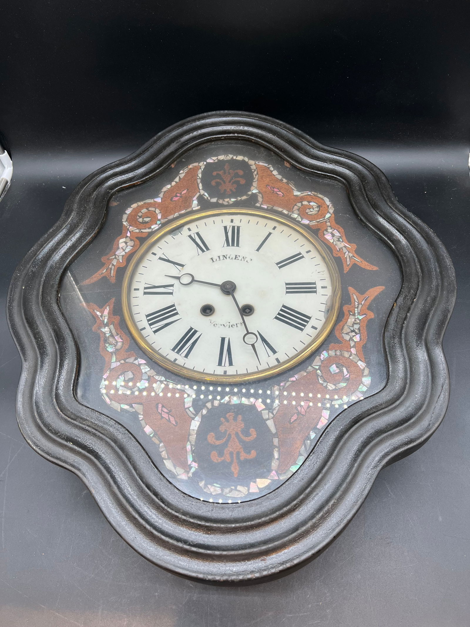 Lin & Enc Verviers Wall Clock: Lin & Enc Verviers Wall Clock. Has key and pendulum