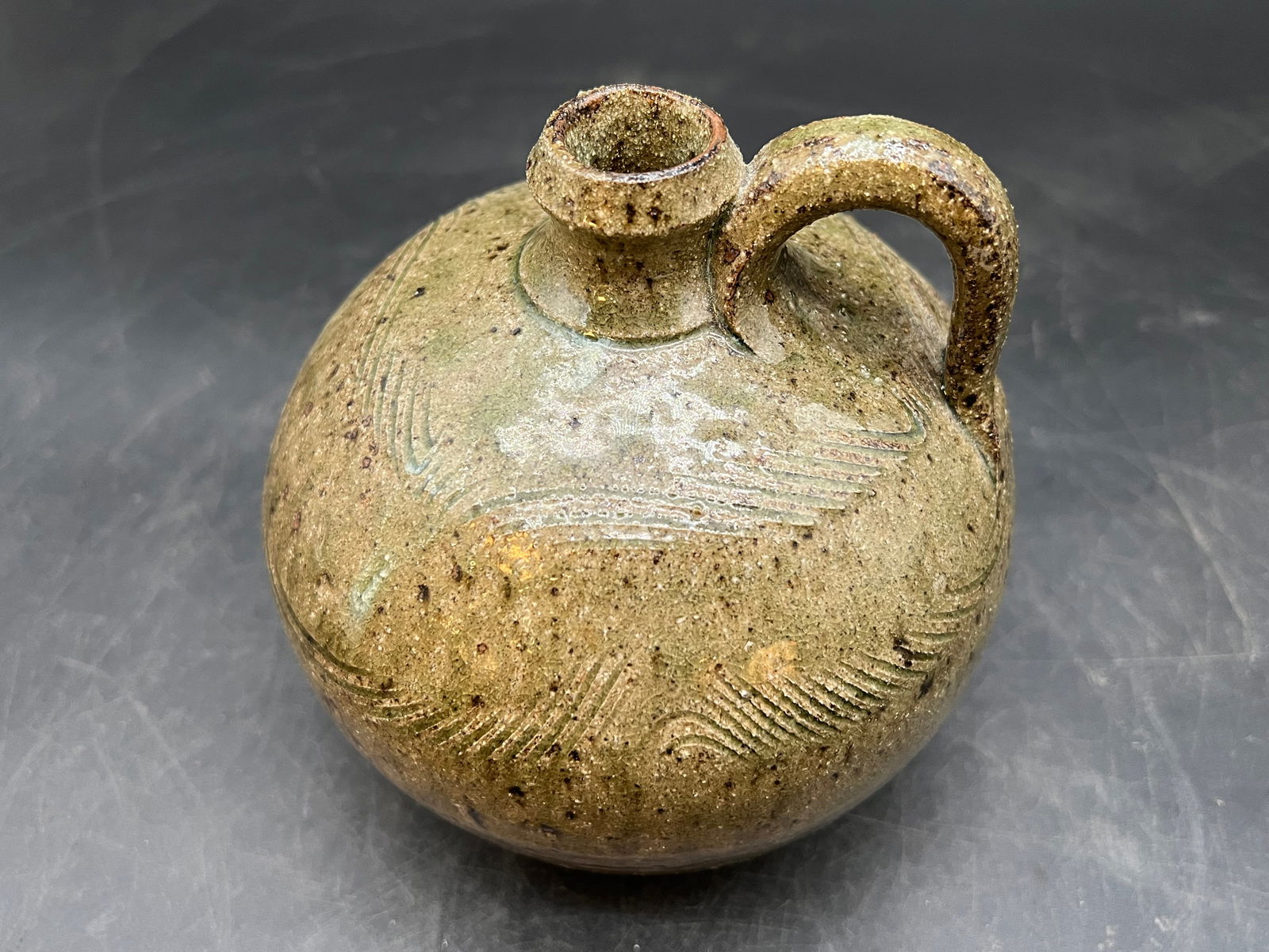 Signed Michael Crocker Stoneware Jug: Signed Michael Crocker Stoneware Jug. Brown glazed. Small spout