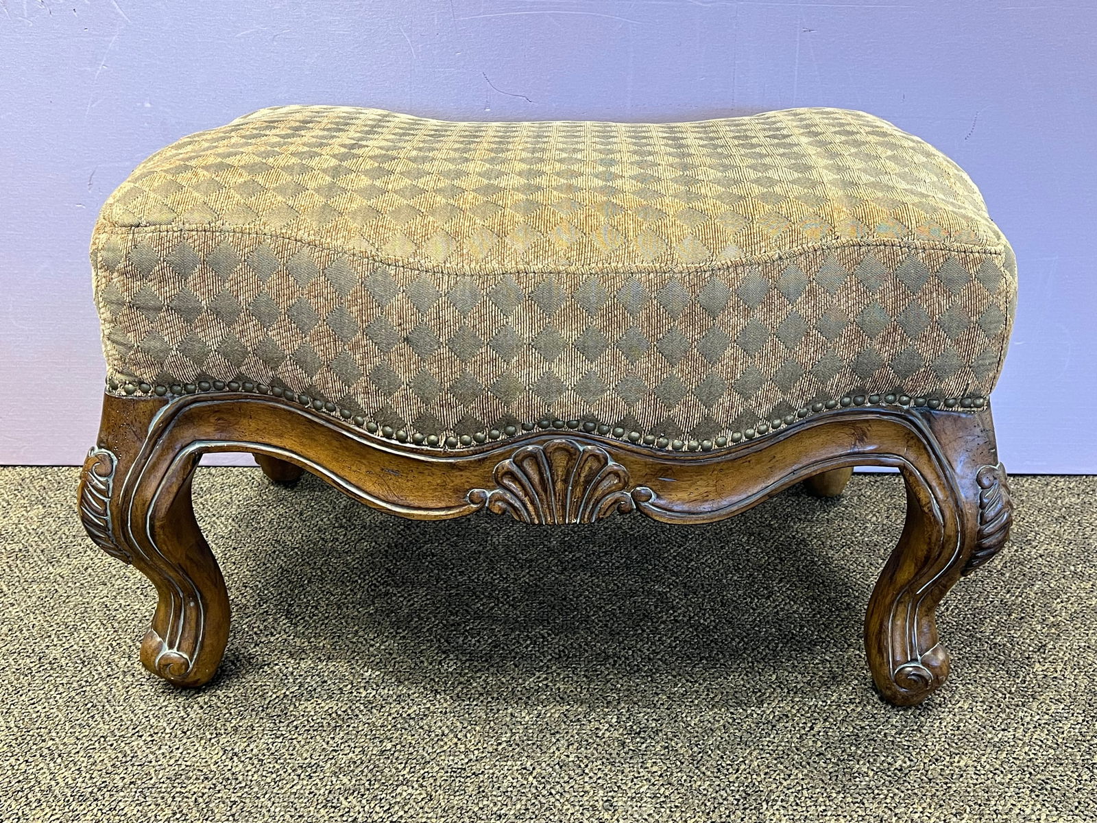 Yellow Upholstered Armchair and Footstool: Yellow Upholstered Armchair and Footstool. Carved decorations