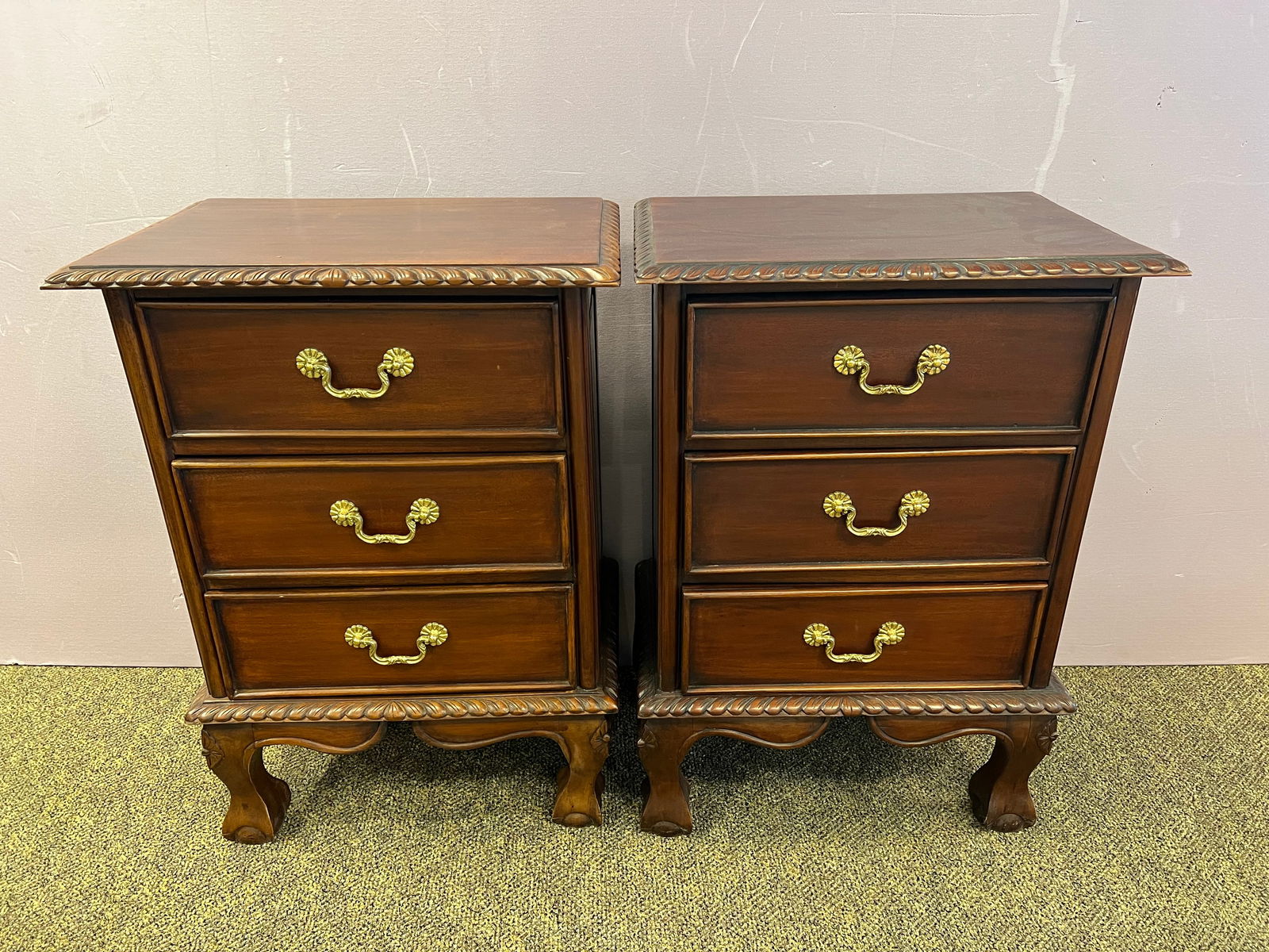 Pair of Mahogany Nightstands: Pair of Mahogany Nightstands. 3 drawer. Chippendale Ball and claw foot legs. Brass handles