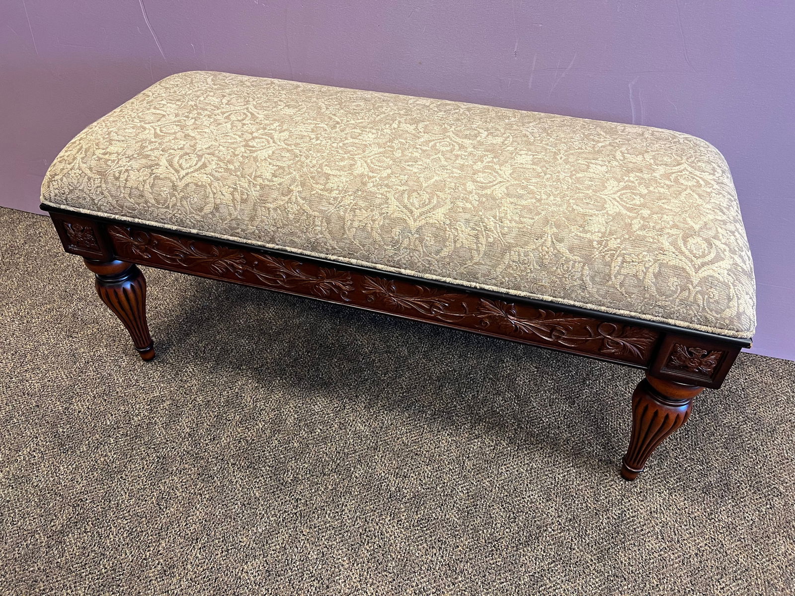 Bombay Co. Mahogany Creme Upholstered Bench: Bombay Co. Mahogany Creme Upholstered Bench. Ornate carved wood base.