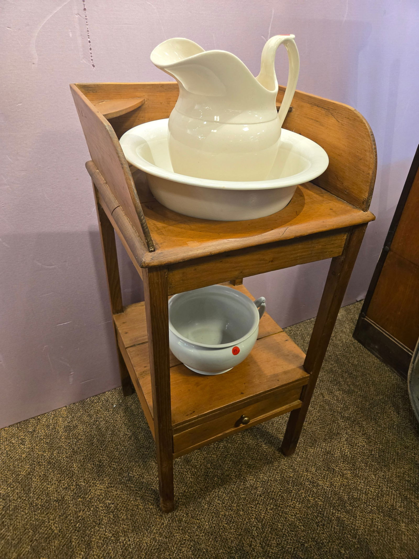 Early Washstand: Early Washstand. Comes with pitcher and basin. 1 drawer.