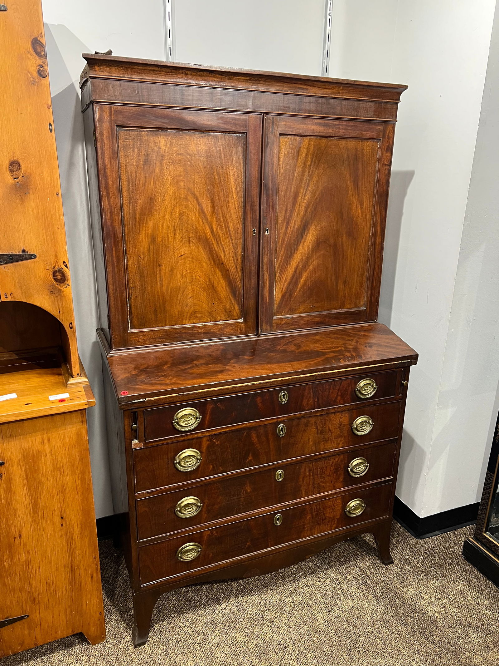Burl Walnut Secretary Desk: Burl Walnut Secretary Desk. Brass handles and keyholes. 4 drawers. Double closed doors on top