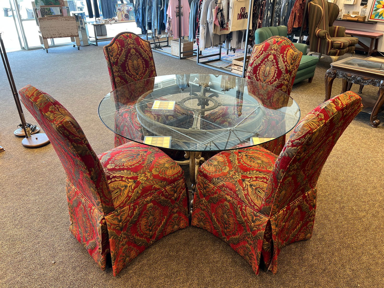 Glass Top Table with 4 Upholstered Chairs: Glass Top Table with 4 Upholstered Chairs. Metal base to the table. Chairs measure 42 x 17.5 x 22