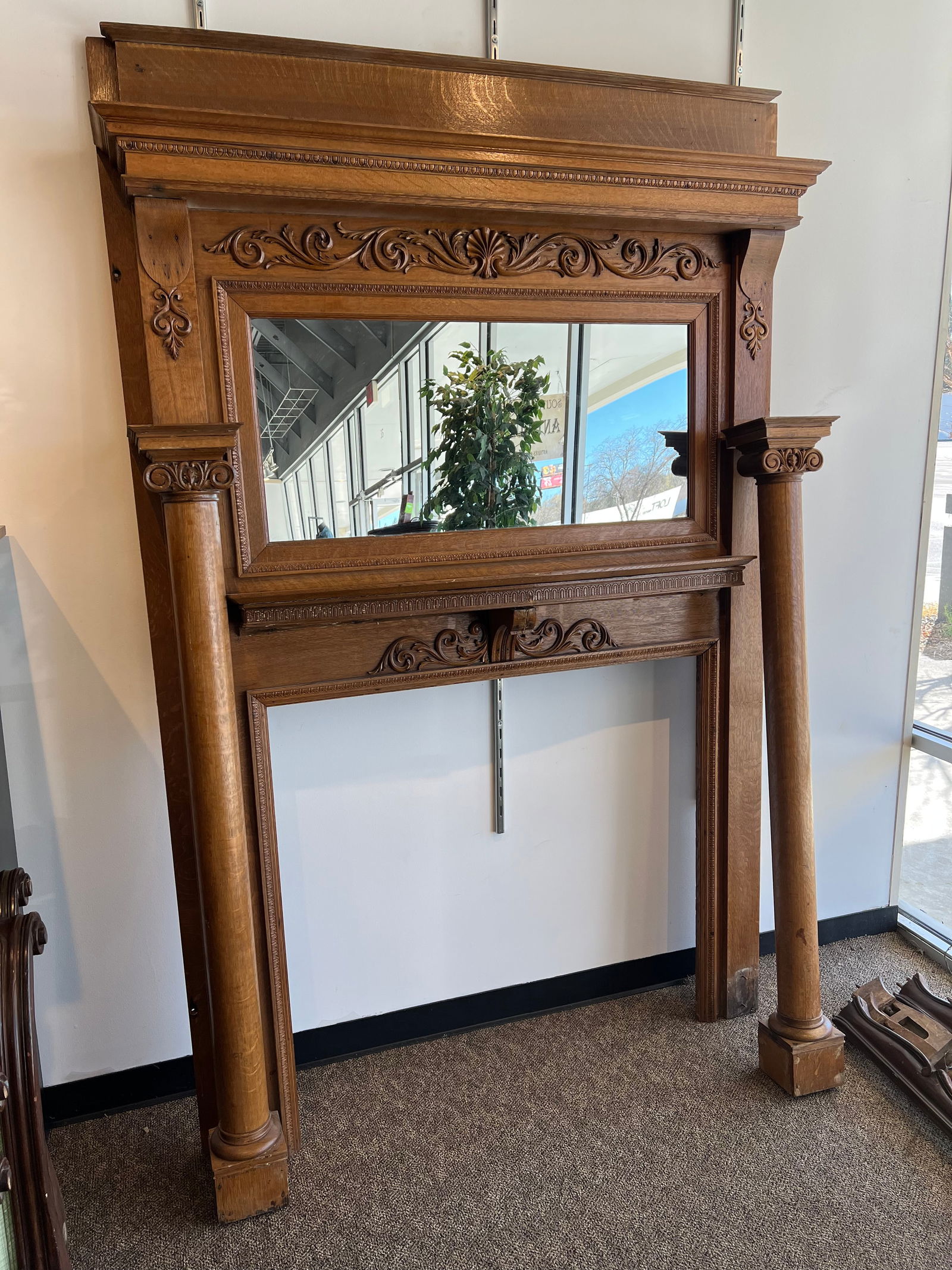 Early Oak Mantle: Early Oak Mantle. Straight mirror. Pedestal on either side. Carved decorations
