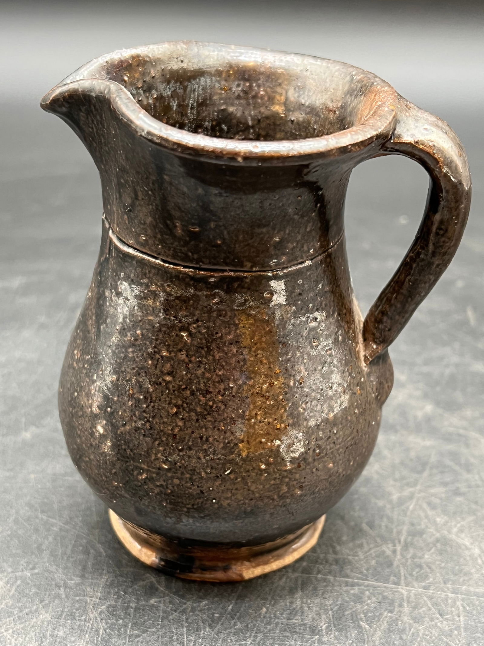 Brown Stoneware Pitcher: Brown Stoneware Pitcher. Brown salt glaze