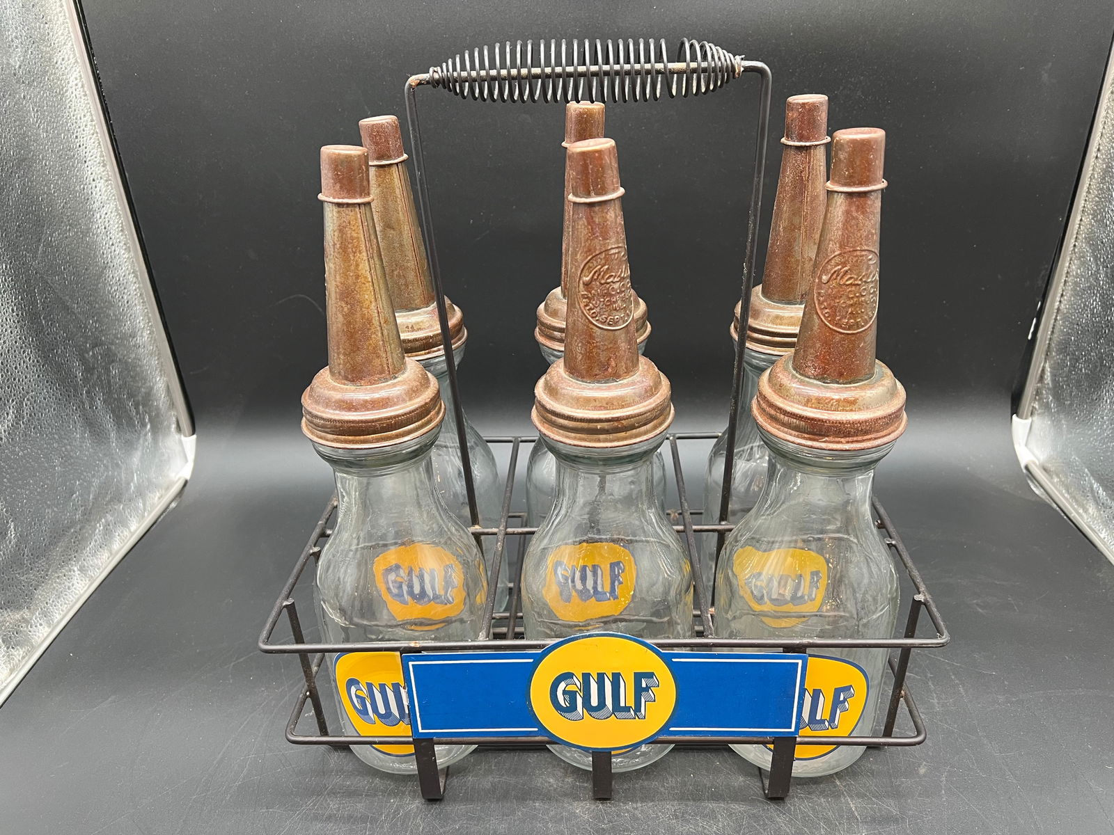 Gulf Motor Oil Bottle Set: Gulf Motor Oil Bottle Set. Metal carrier. Glass bottles with metal spout