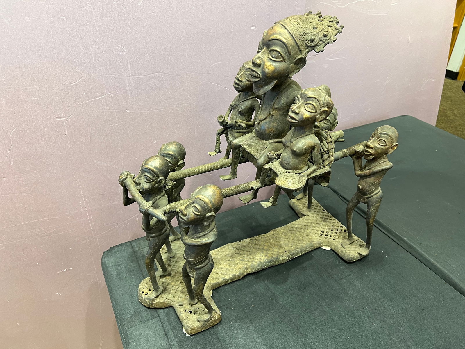 African Bronze Statue: African Bronze Statue. Depicts king being carried by servants