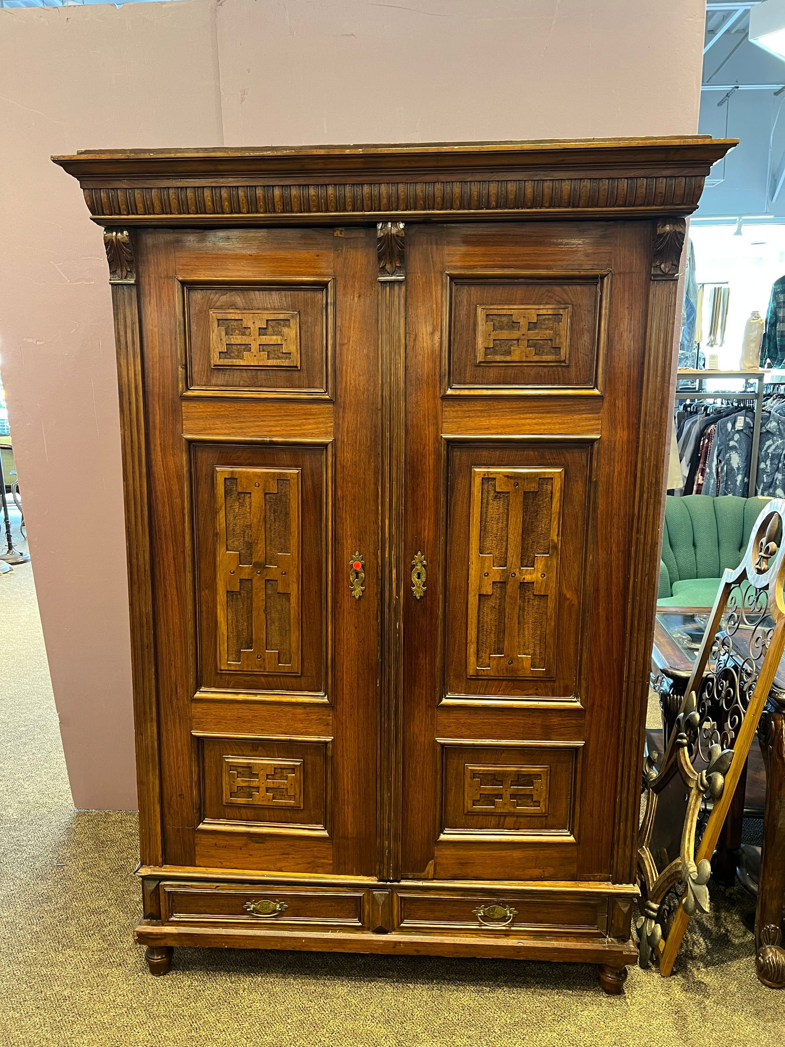 French Walnut Armoire: French Walnut Armoire. Has 2 drawers and 2 doors. Carved decorated doors