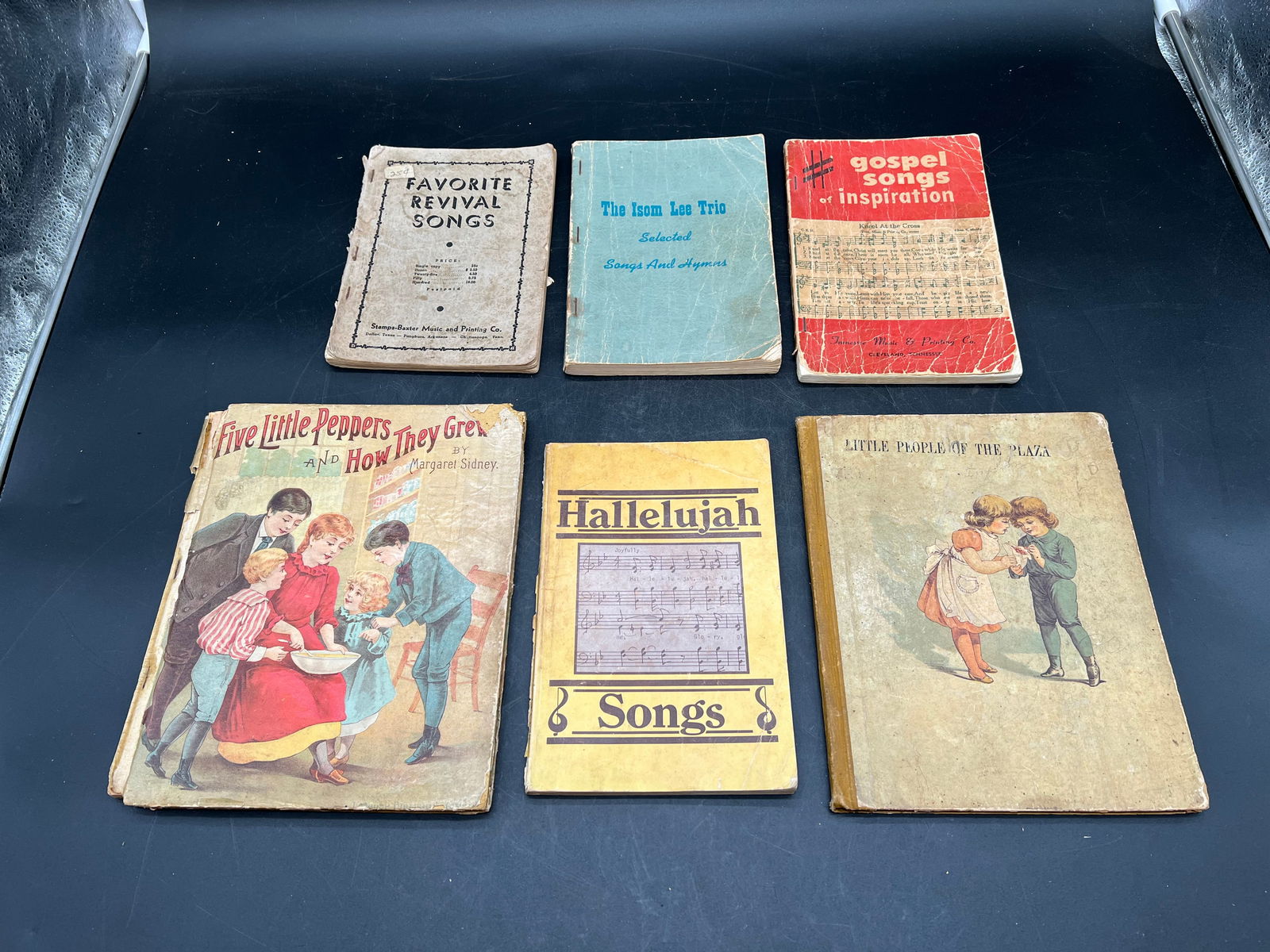 Lot of Early Books: Lot of Early Books. Favorite revival songs, The Isom Lee Trio Selected Songs and Hymns, Gospel Songs Of Inspiration, Hallelujah Songs, Five Little Peppers and How they Grew, and Little People of Plaza