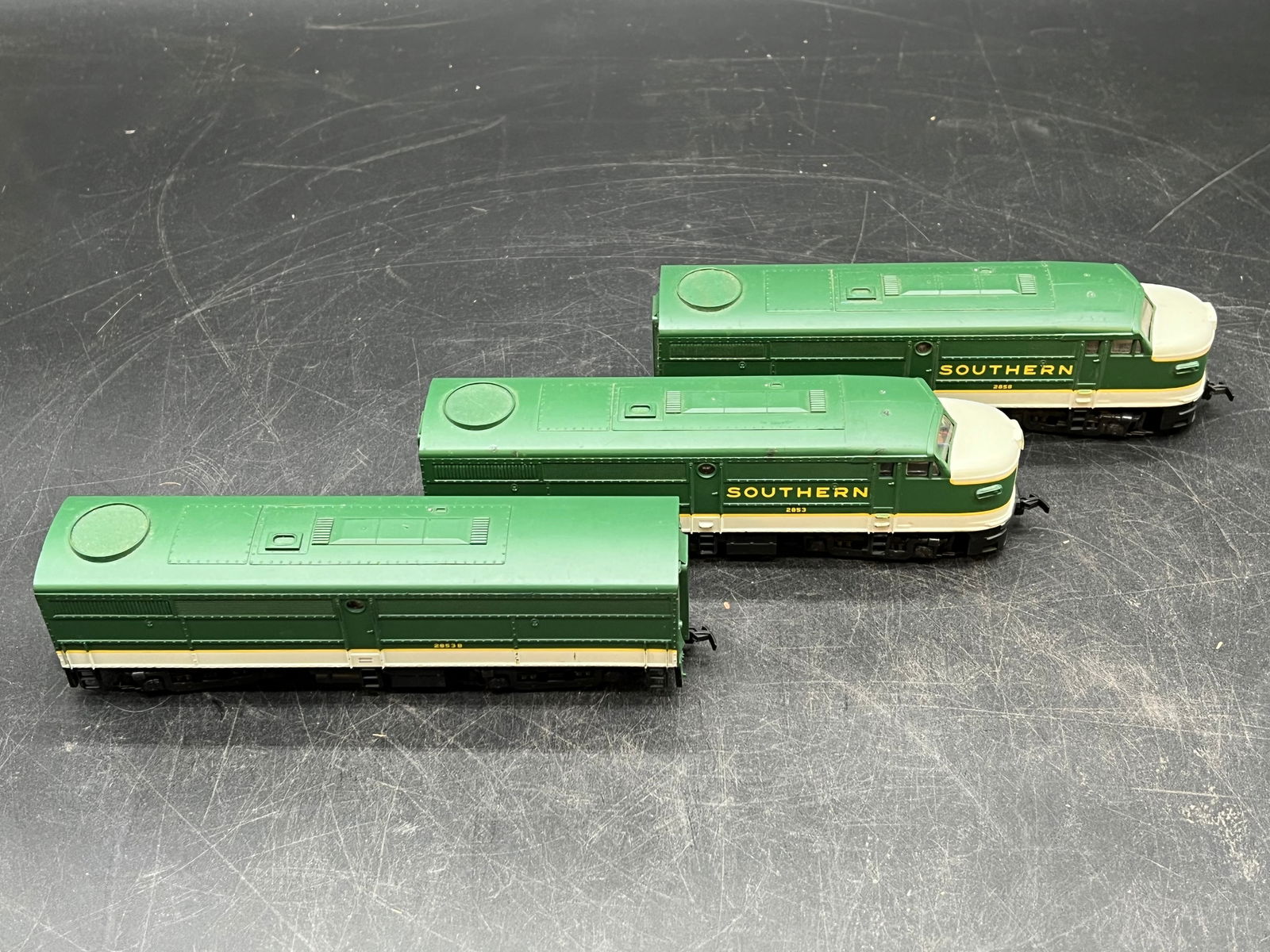 Lot of 3 HO Scale Train Cars: Lot of 3 HO Scale Train Cars. 2 engines and 1 car