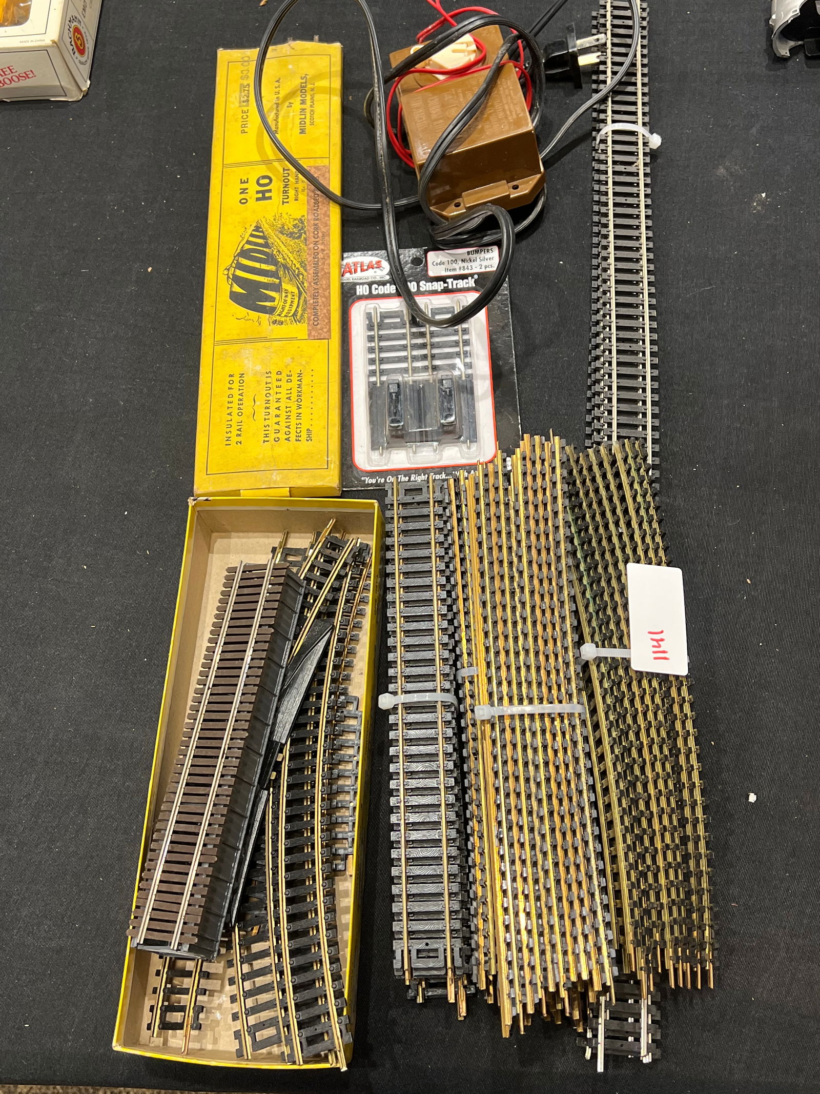 HO Scale Railroad Trackl and Transformer: HO Scale Railroad Trackl and Transformer. Straight and curved track