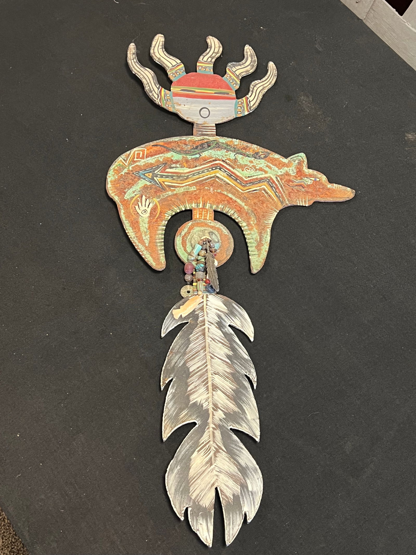 Metal Indian Metal Cutout With Beadwork: Metal Indian Metal Cutout With Beadwork. Robert Schultz. Beark,snake, feathers on it